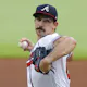 Spencer Strider #65 of the Atlanta Braves pitches as we look at the 2024 MLB wins leader odds heading into spring training.