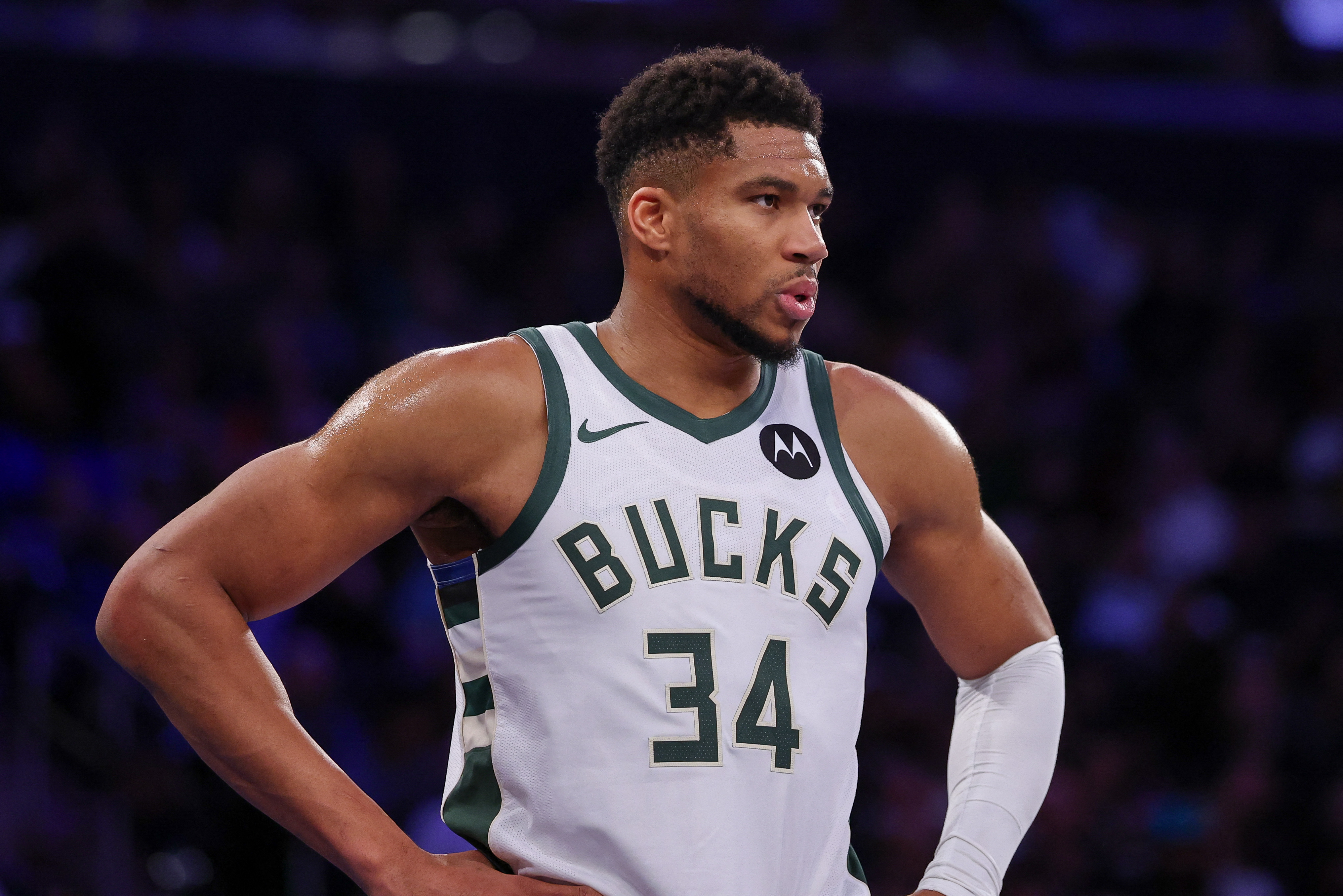 Milwaukee Bucks forward Giannis Antetokounmpo (34), seen here looking on during a game, is featured in our NBA player props today.