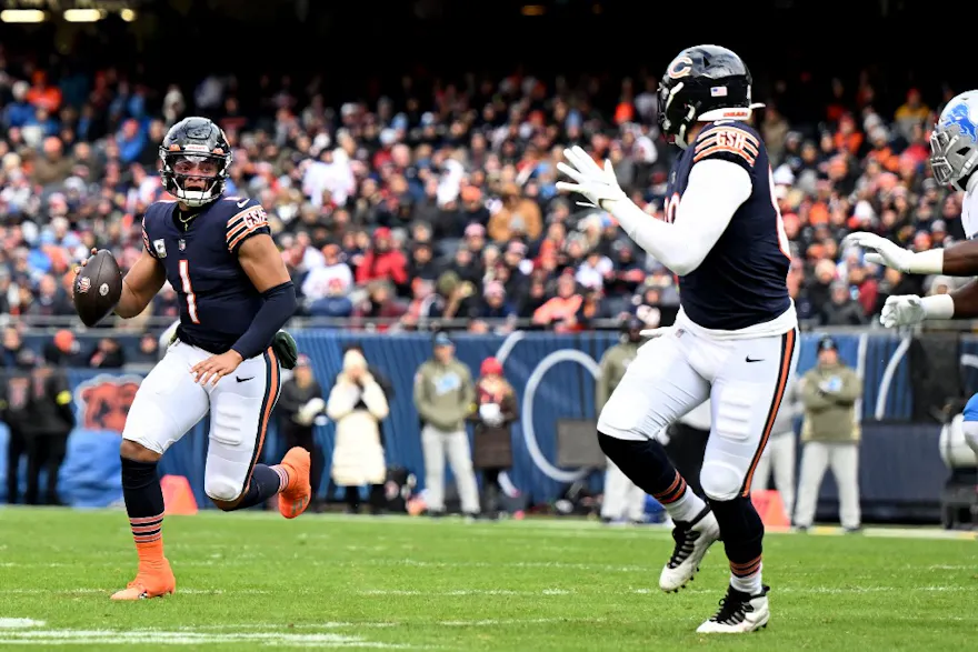 Justin Fields of the Chicago Bears attempts a pass against the Detroit Lions at Soldier Field on Nov. 13, 2022 in Chicago, Illinois.