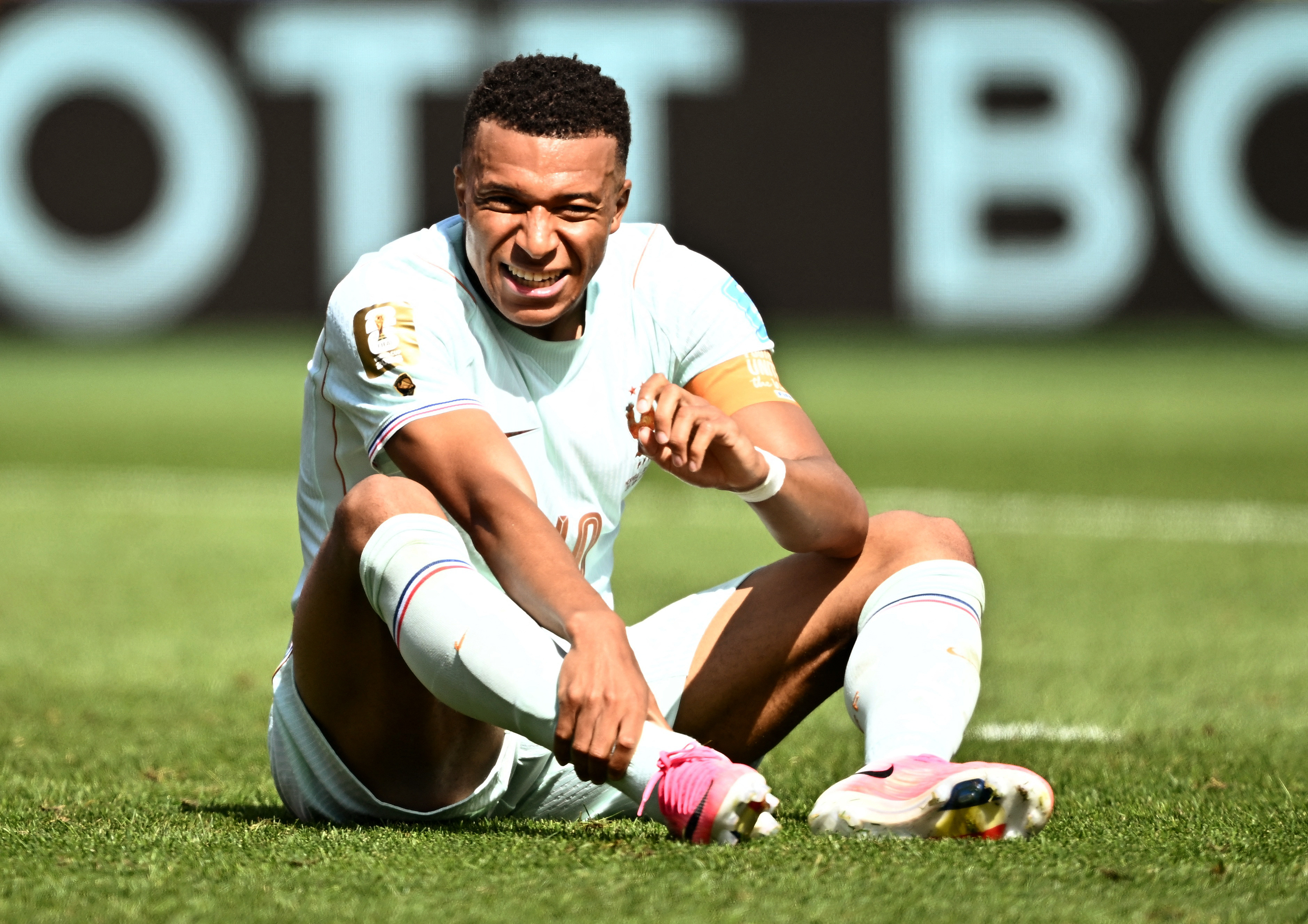 France's Kylian Mbappe reacts on the ground as we make our best World Cup parlay today.
