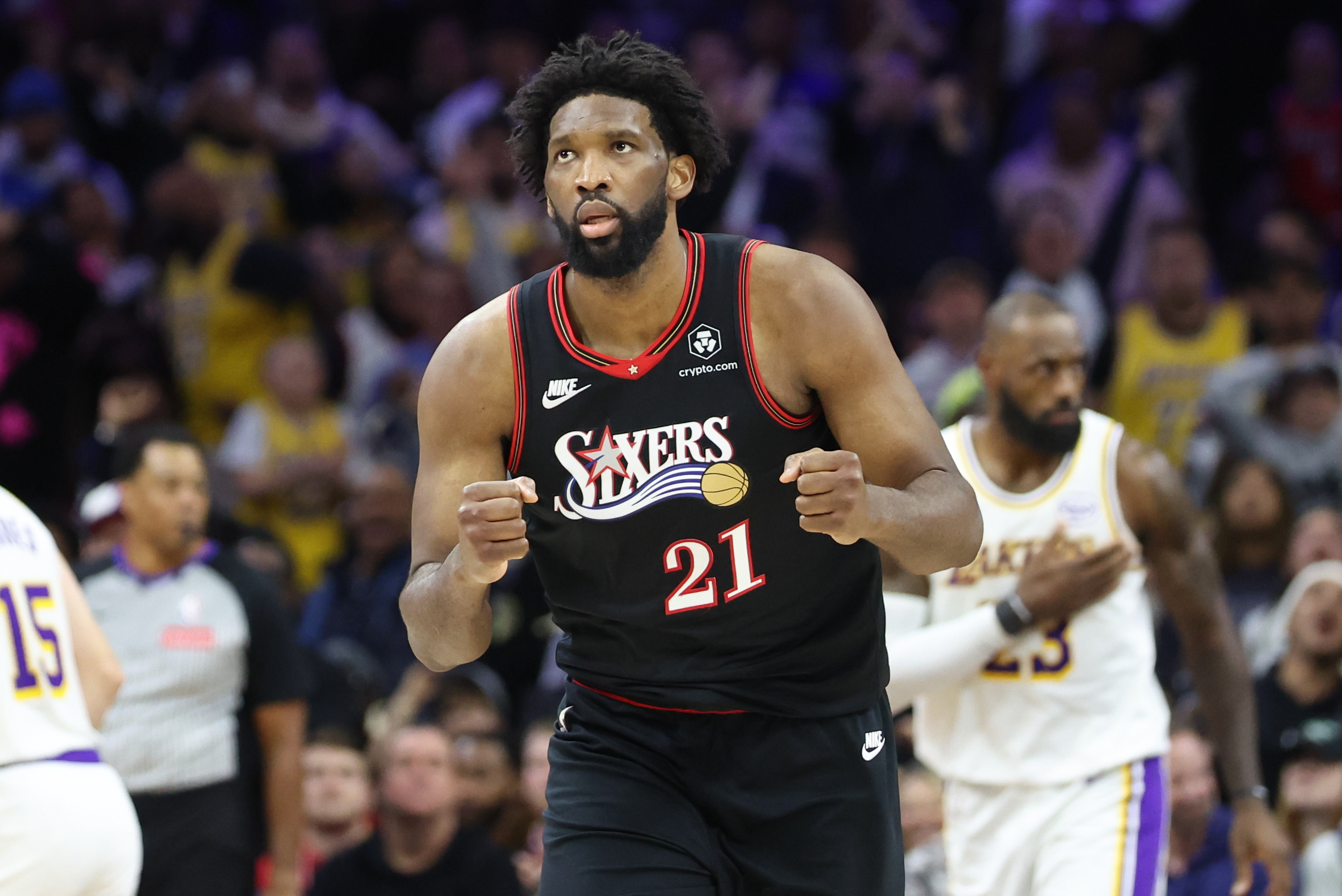 Philadelphia 76ers center Joel Embiid (21), seen here reacting to a score, is featured in our NBA player props tonight.