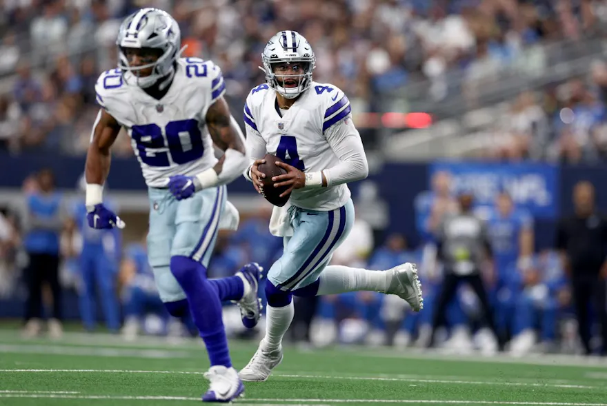 Dak Prescott of the Dallas Cowboys scrambles with the ball against the Detroit Lions at AT&T Stadium in Arlington, Texas. Photo by Tom Pennington/Getty Images via AFP.