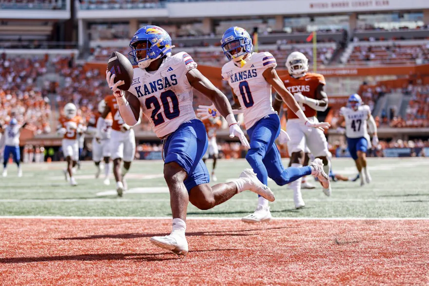 Daniel Hishaw Jr. #20 of the Kansas Jayhawks returns a fumble as we look at our college football player props for Week 6