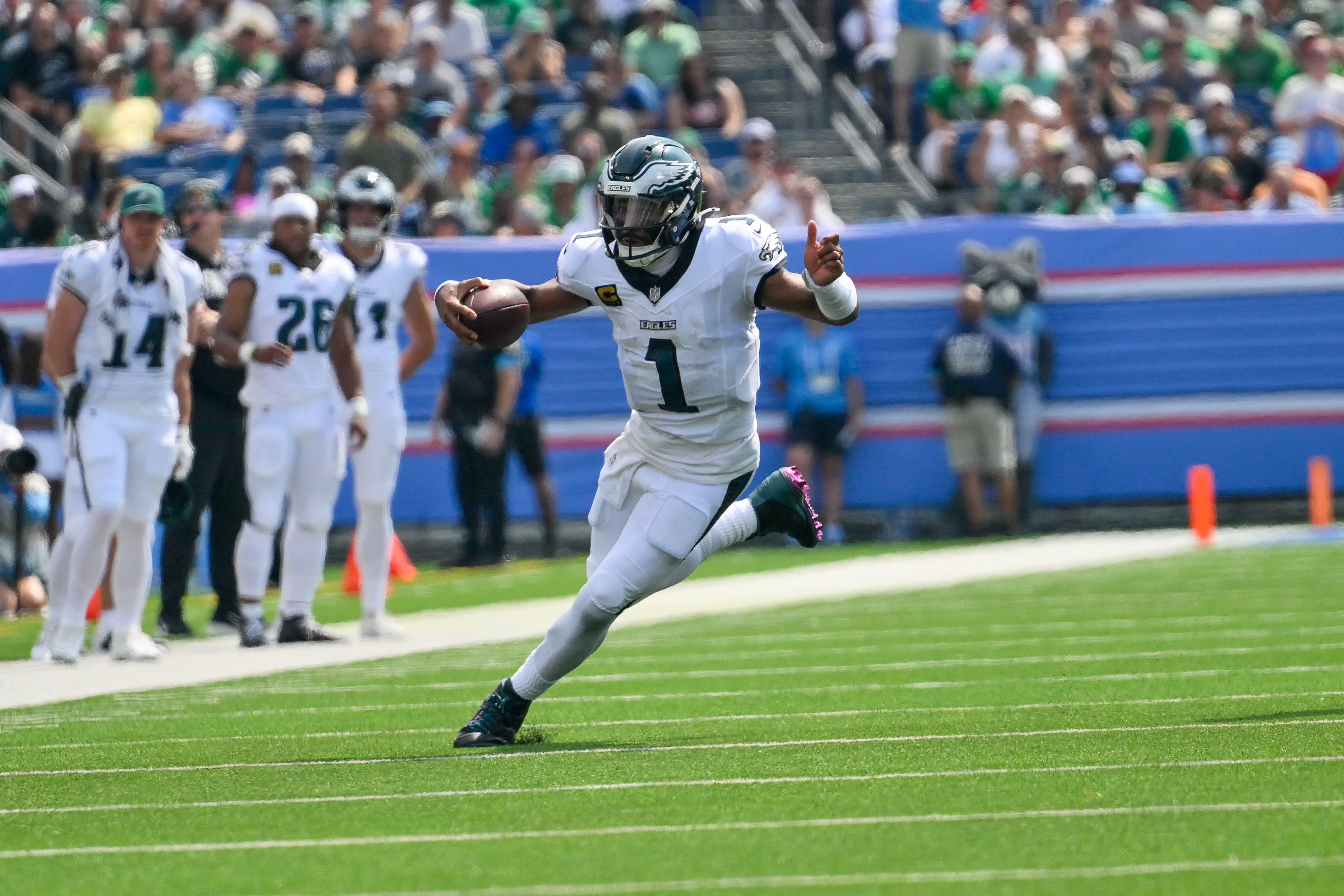 Philadelphia Eagles quarterback Jalen Hurts (1) scrambles as he is featured in our Eagles vs. Bears prediction.