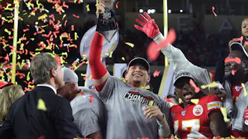 Patrick Mahomes #15 of the Kansas City Chiefs raises the Vince Lombardi Trophy after defeating the San Francisco 49ers 31-20 in Super Bowl LIV at Hard Rock Stadium on Feb. 2, 2020 in Miami, Florida. 