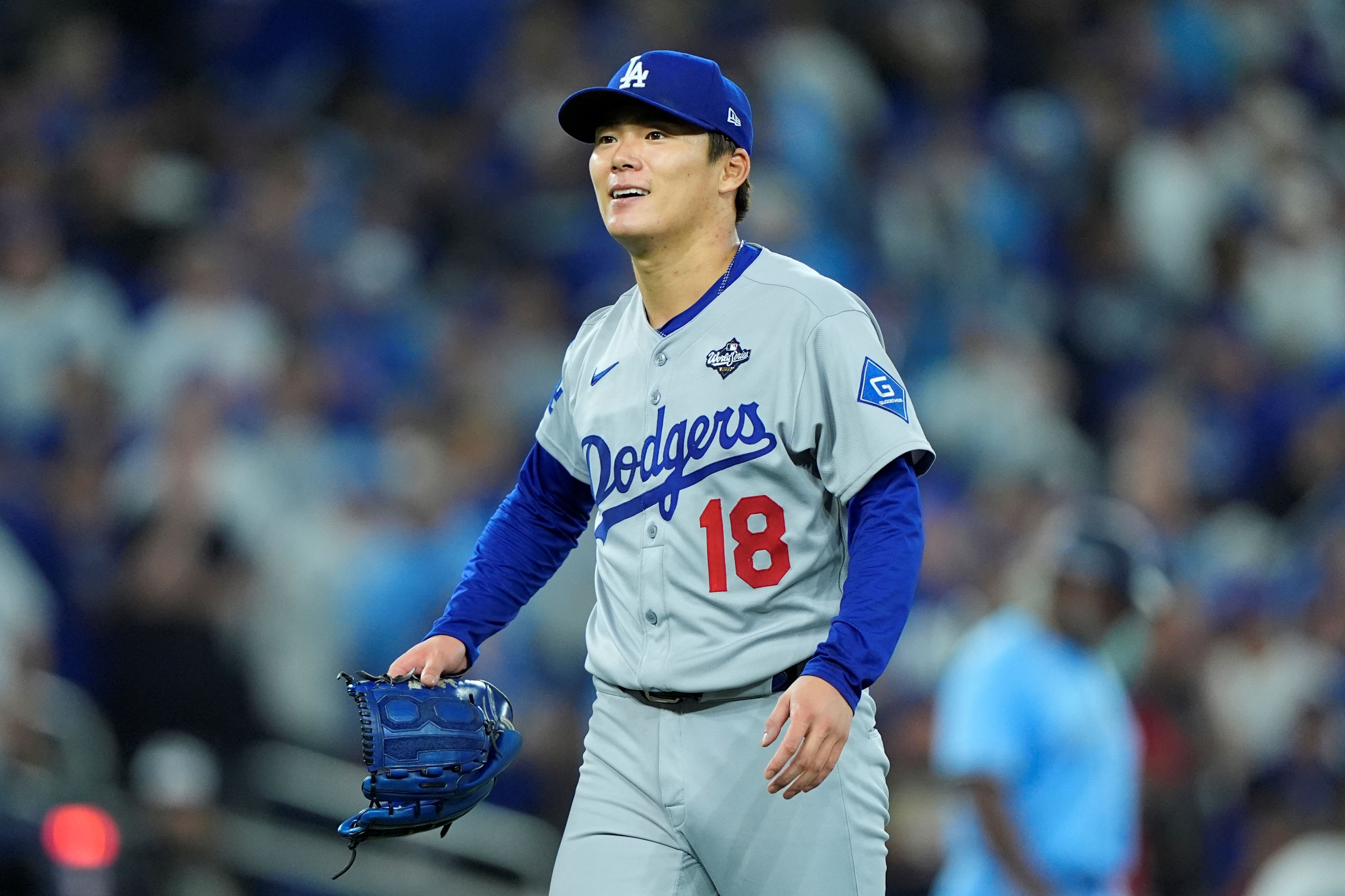 Los Angeles Dodgers pitcher Yoshinobu Yamamoto reacts, and he's featured prominently in the MLB Cy Young odds