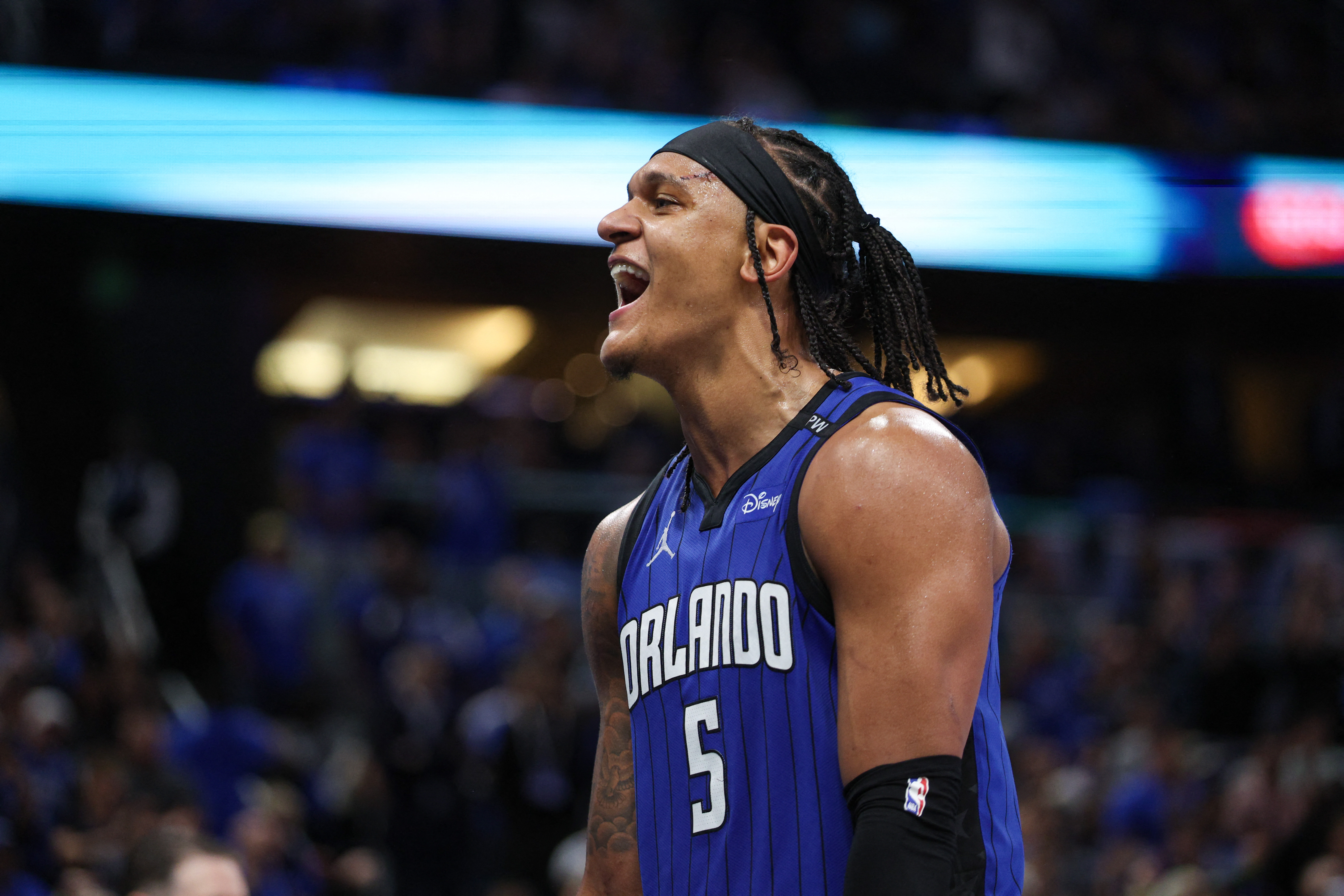 Orlando Magic forward Paolo Banchero (5), seen here reacting during a game, is featured in our Magic vs. 76ers player props.