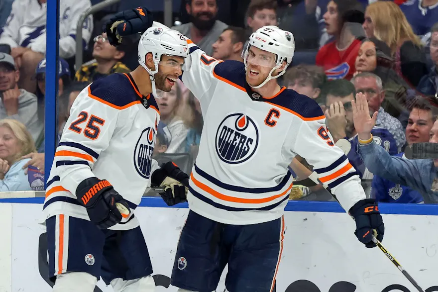 Connor McDavid and Darnell Nurse of the Edmonton Oilers celebrate a goal.
