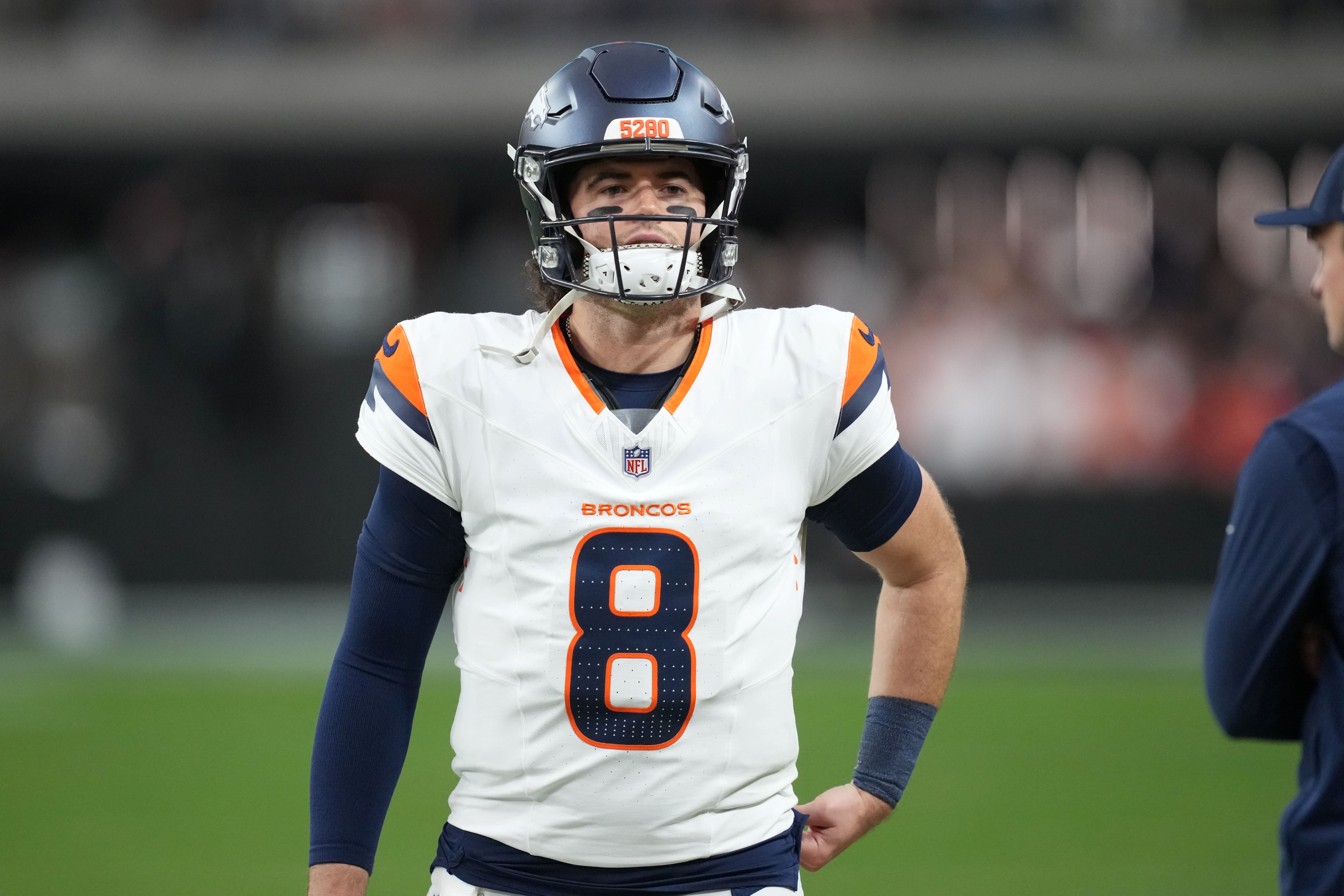 Denver Broncos quarterback Jarrett Stidham stands on the sidelines, and he's key as we look at Jarrett Stidham vs. Nick Foles