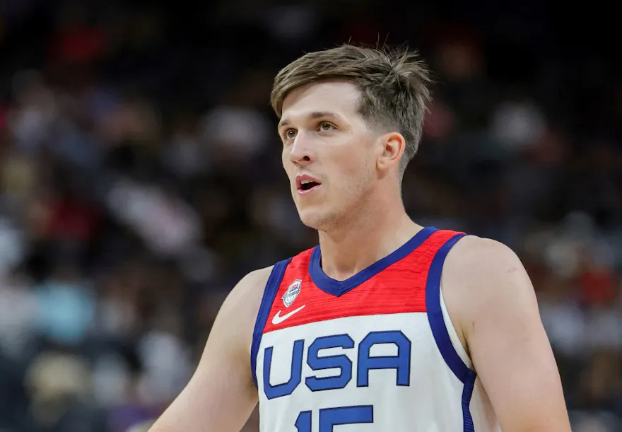Austin Reaves of the United States walks on the court during a break in the second half of a 2023 FIBA World Cup exhibition game against Puerto Rico, and we offer new U.S. bettors our exclusive Caesars promo code for USA vs. New Zealand.