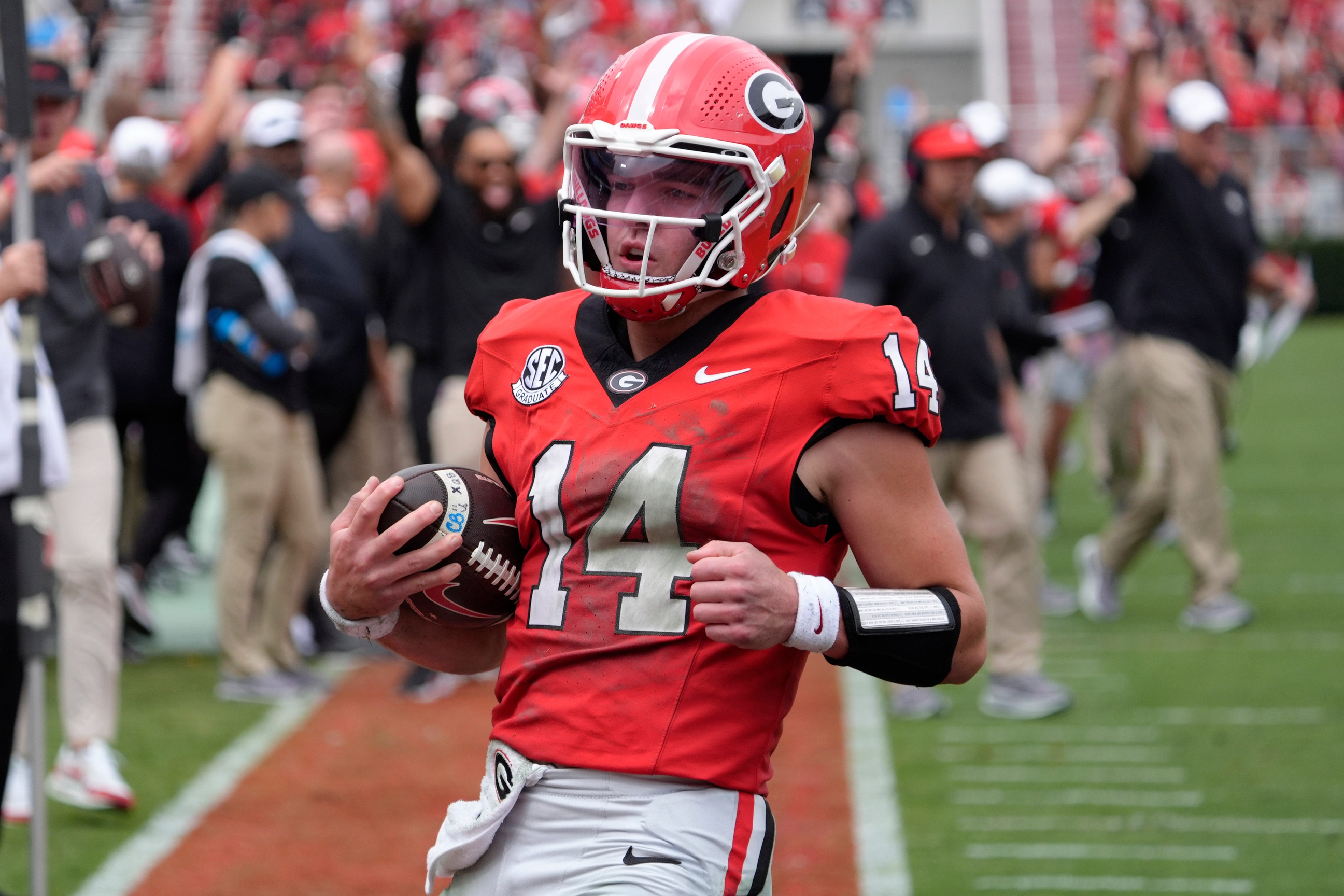 Georgia quarterback Gunner Stockton runs in for a touchdown, and he's key to our college football predictions today