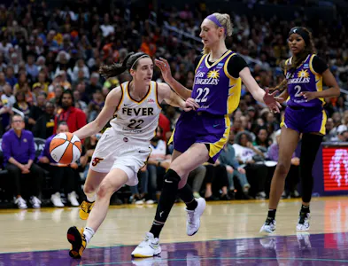 Caitlin Clark of the Indiana Fever dribbles in front of Cameron Brink and Rickea Jackson of the Los Angeles Sparks during a 78-73 Fever win at Crypto.com Arena. We're backing Brink in our Sparks vs. Fever Prediction. 