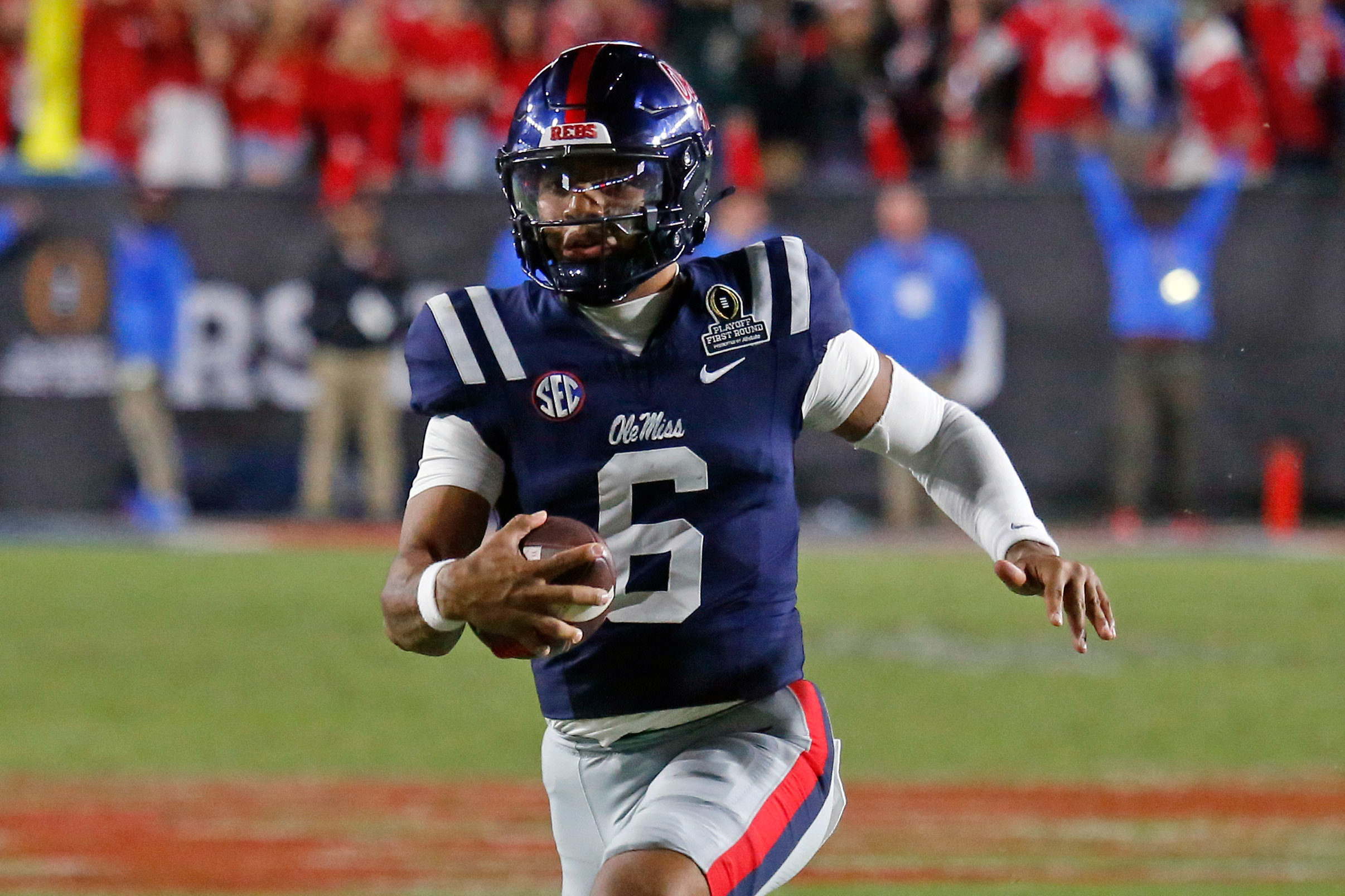 Mississippi Rebels quarterback Trinidad Chambliss (6) runs the ball as we break down our Ole Miss Vs. Georgia player props.