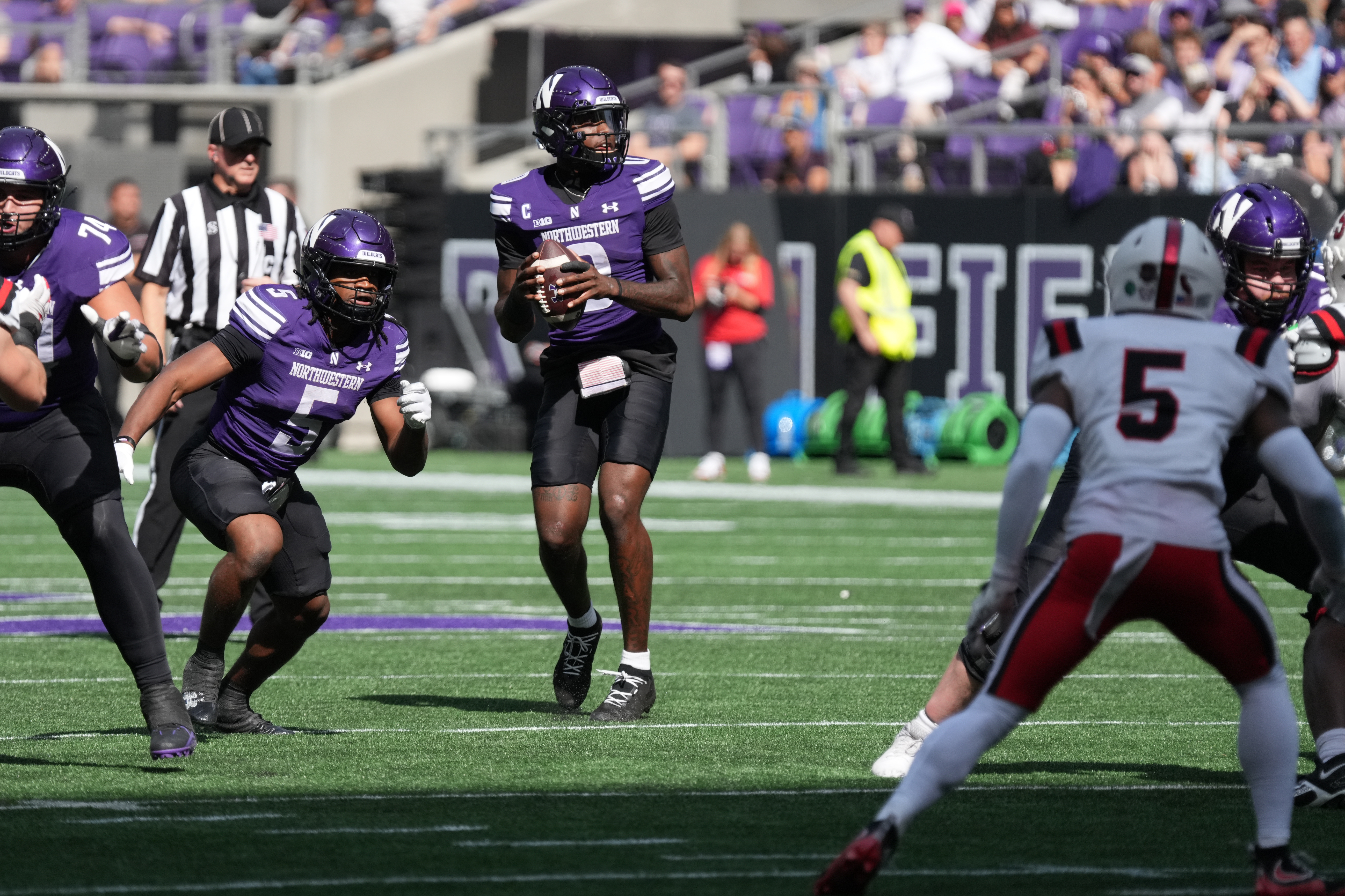 Pictured: Northwestern QB Aidan Chiles in the pocket as we break down our College Football Best Bets for Week 7: Expert Picks & Predictions. Photo by David Banks-Imagn Images.