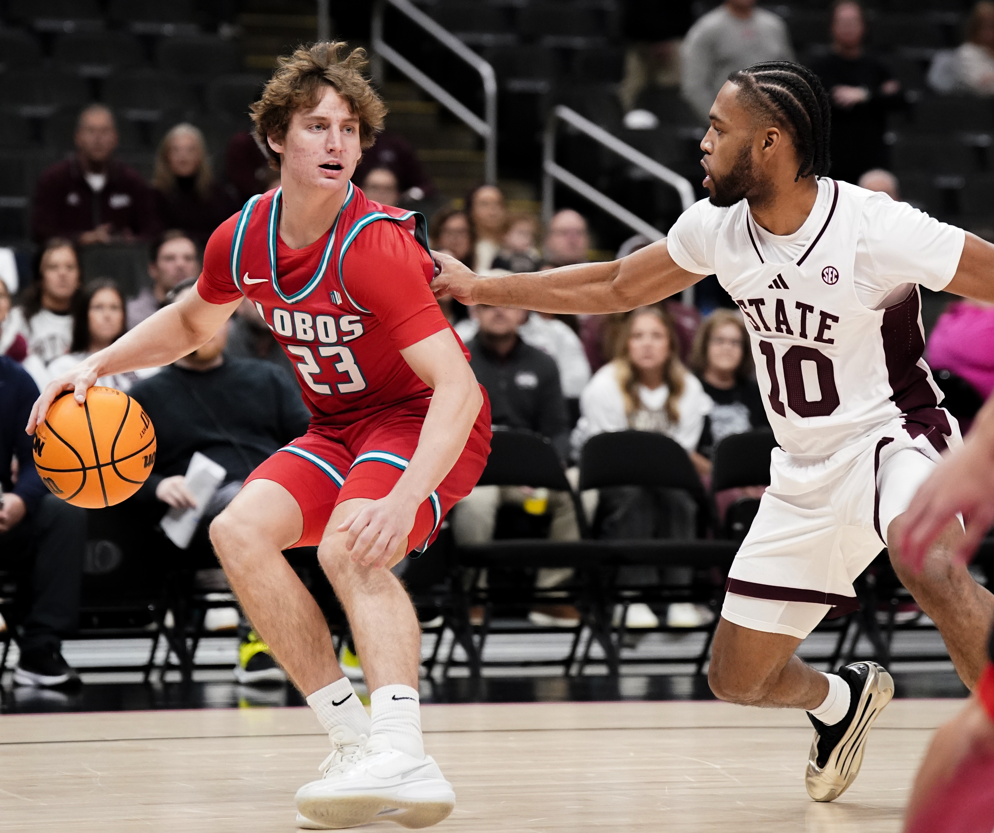 New Mexico Lobos guard Jake Hall controls the ball as we make our best Saint Joseph's vs. New Mexico prediction. 