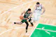 Boston Celtics forward Jayson Tatum controls the ball against Dallas Mavericks guard Luka Doncic in the fourth quarter during Game 2 of the 2024 NBA Finals at TD Garden. We're backing Tatum in our Celtics vs. Mavericks Parlay.