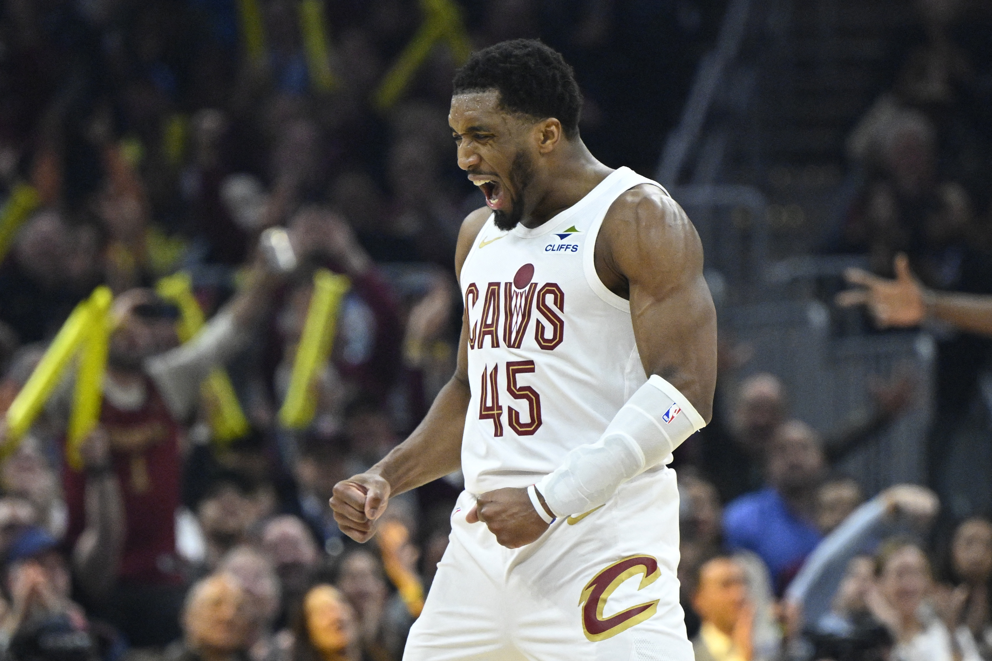Cleveland Cavaliers guard Donovan Mitchell (45) celebrates as we break down our  NBA Play of the Day.