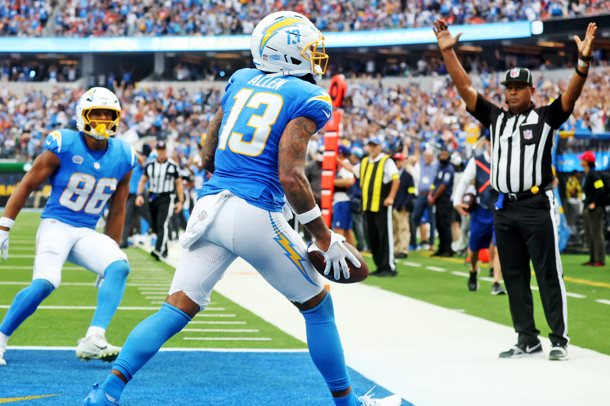 Los Angeles Chargers wide receiver Keenan Allen (13), who is featured in our NFL contract incentives tracker, catches a pass for a touchdown.