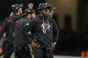 Atlanta Falcons head coach Raheem Morris is shown reacting on the sideline as we look at challenges to Georgia's sports betting laws.