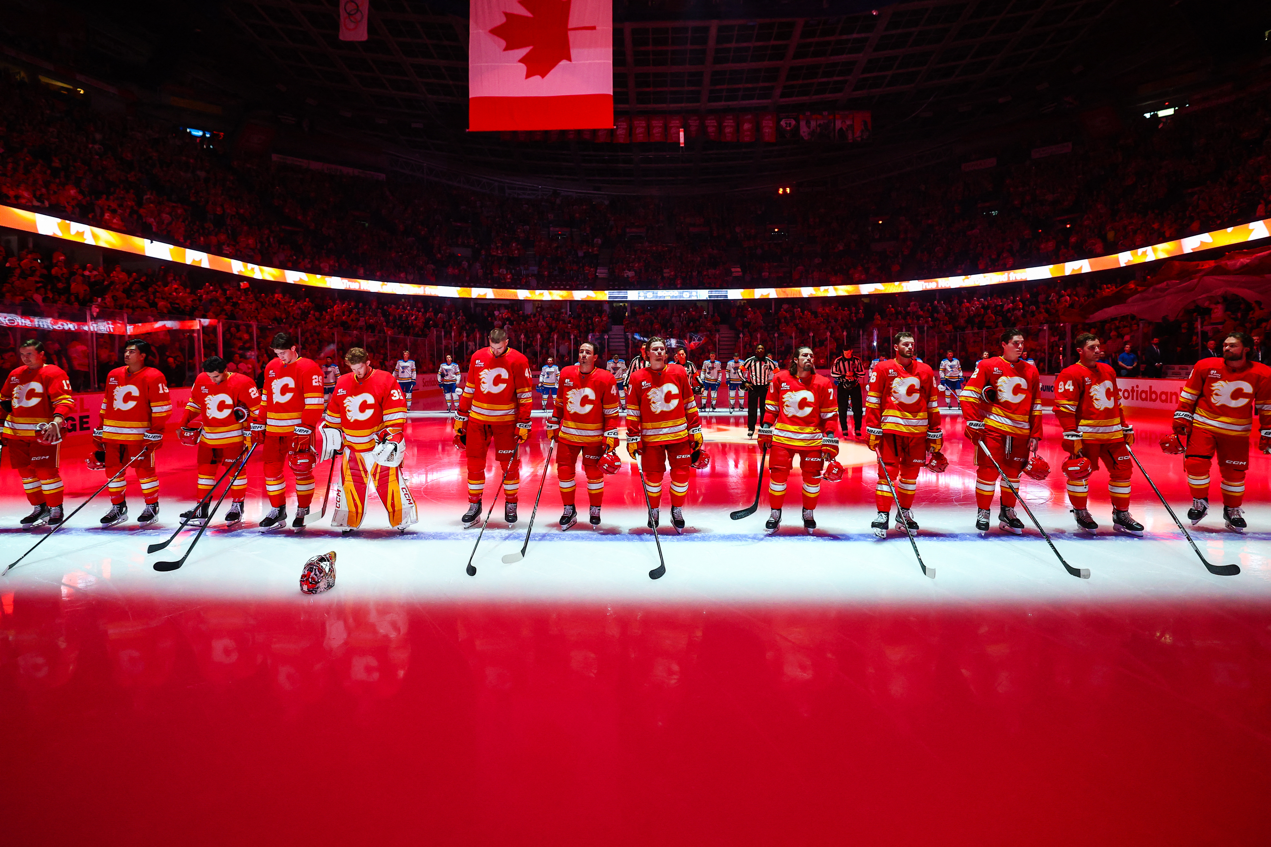 Calgary Flames players on the ice as we look at the launch of the legal sports betting market.