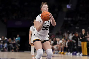Iowa Hawkeyes guard Teagan Mallegni shoots a free throw as we look at Iowa sports betting and casino financials for October 2024
