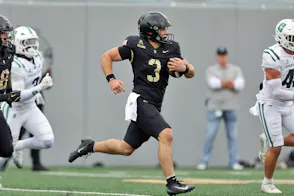 Army Black Knights quarterback Cale Hellums (3) runs with the ball as we make our best Army vs. Air Force early prediction