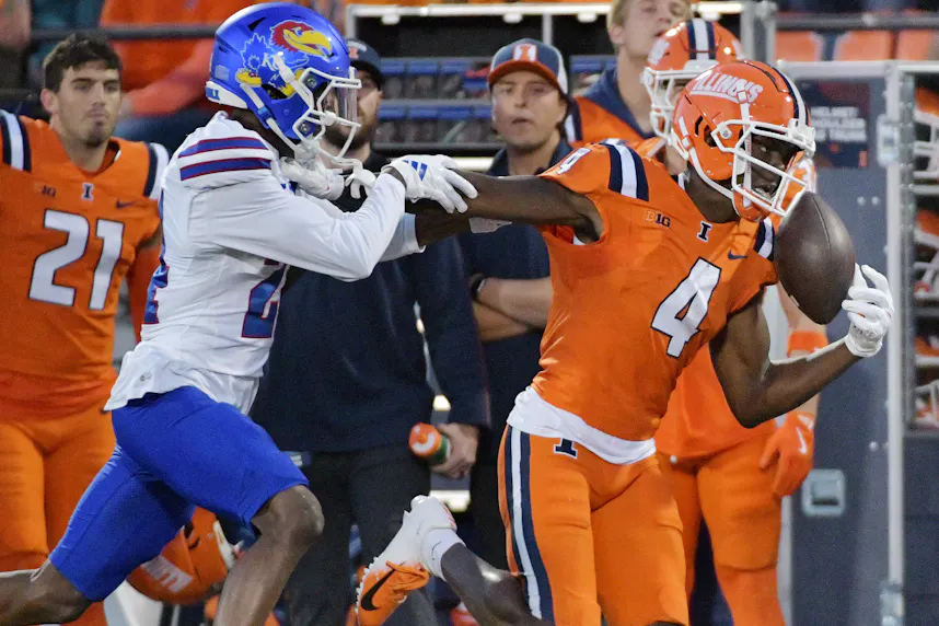 Illinois Fighting Illini wide receiver Zakhari Franklin (4) catches a touchdown as we offer our best Week 5 college football player prop bets.