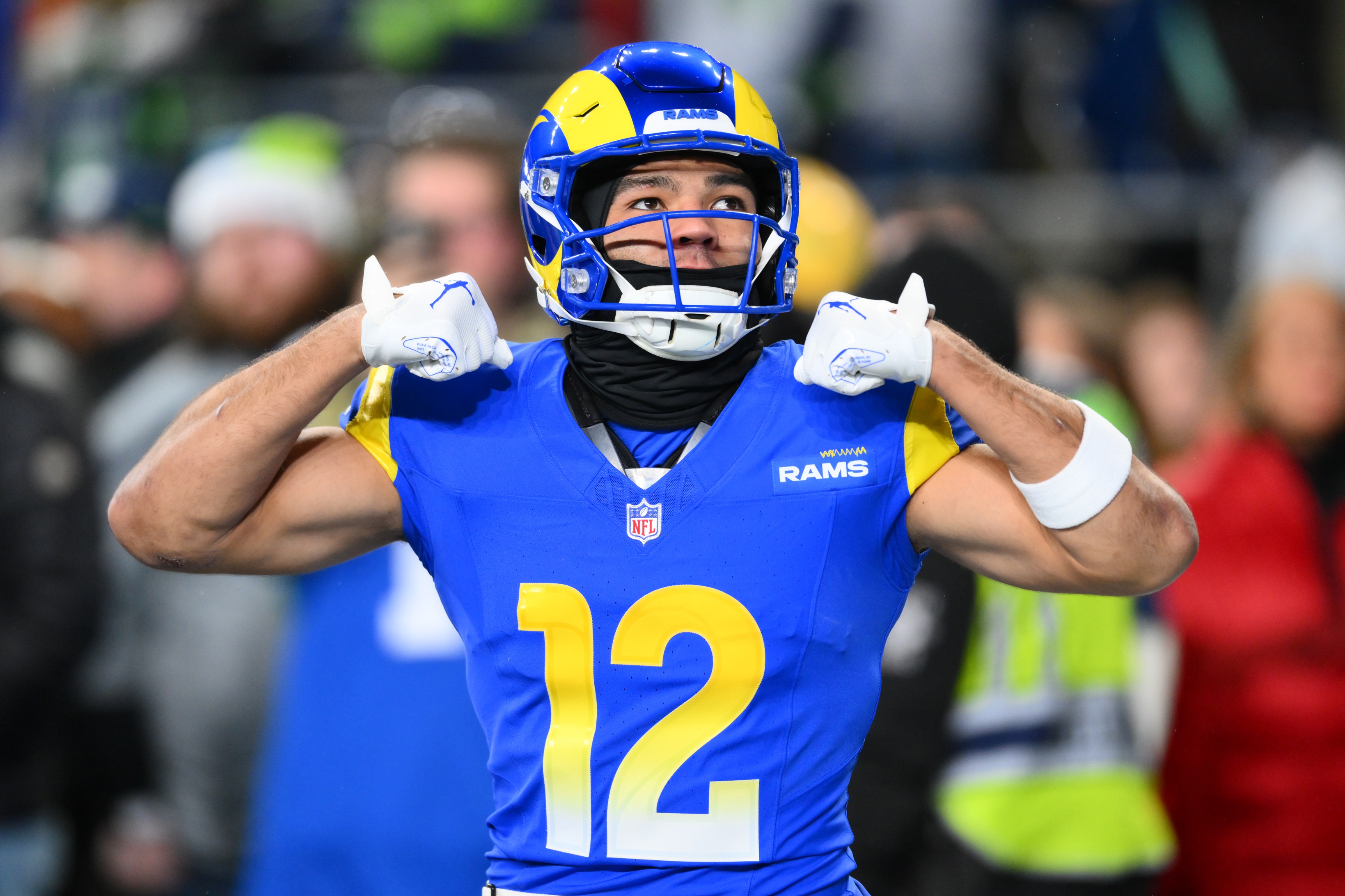  Los Angeles Rams wide receiver Puka Nacua (12) celebrates as he is featured in our Rams vs. Falcons predictions.