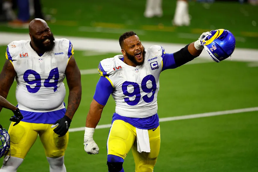 Aaron Donald of the Los Angeles Rams reacts after a sack on Joe Burrow of the Cincinnati Bengals during Super Bowl LVI at SoFi Stadium.
