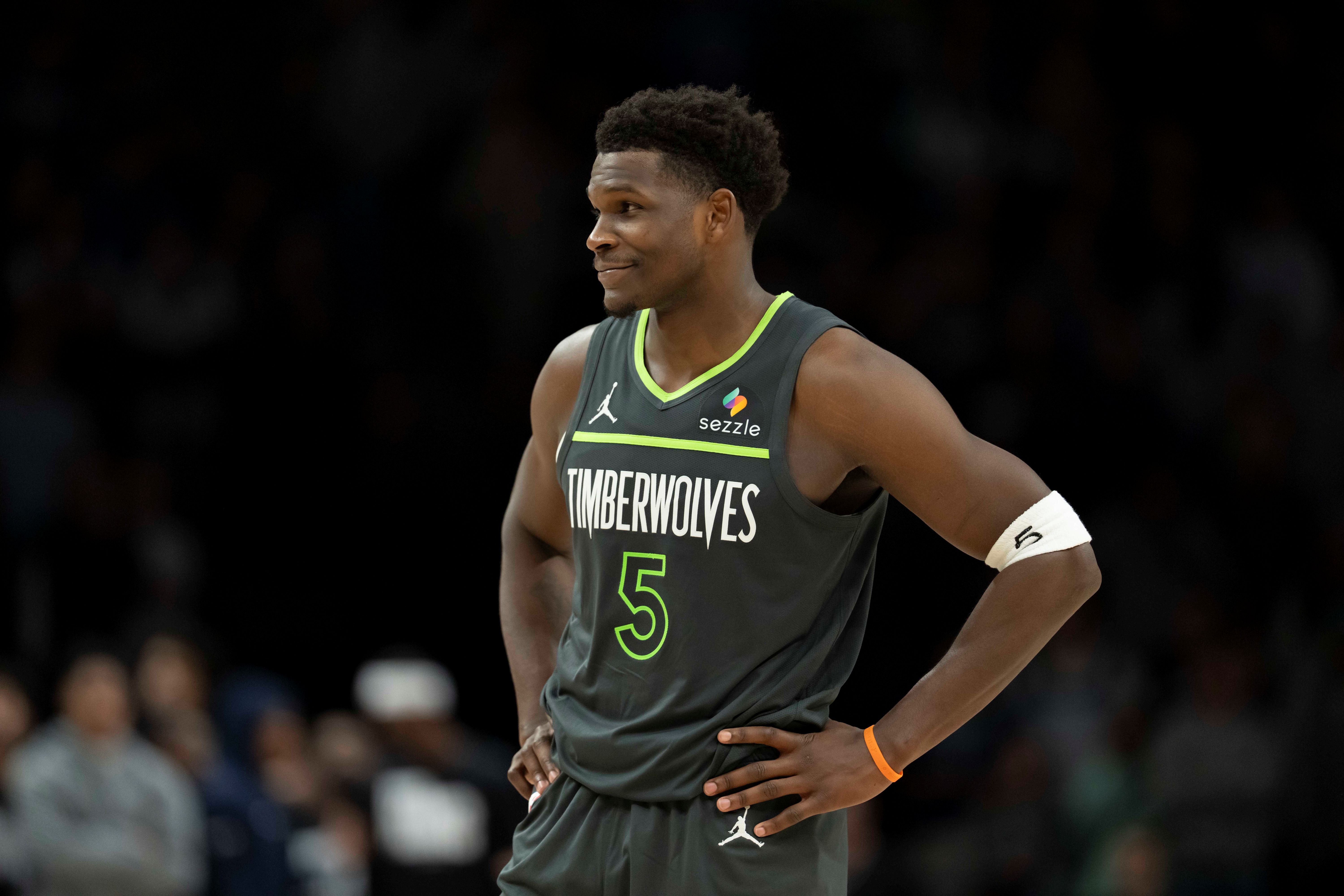 Minnesota Timberwolves guard Anthony Edwards (5), seen here looking on, is featured in our Mavericks vs. Timberwolves player props tonight.