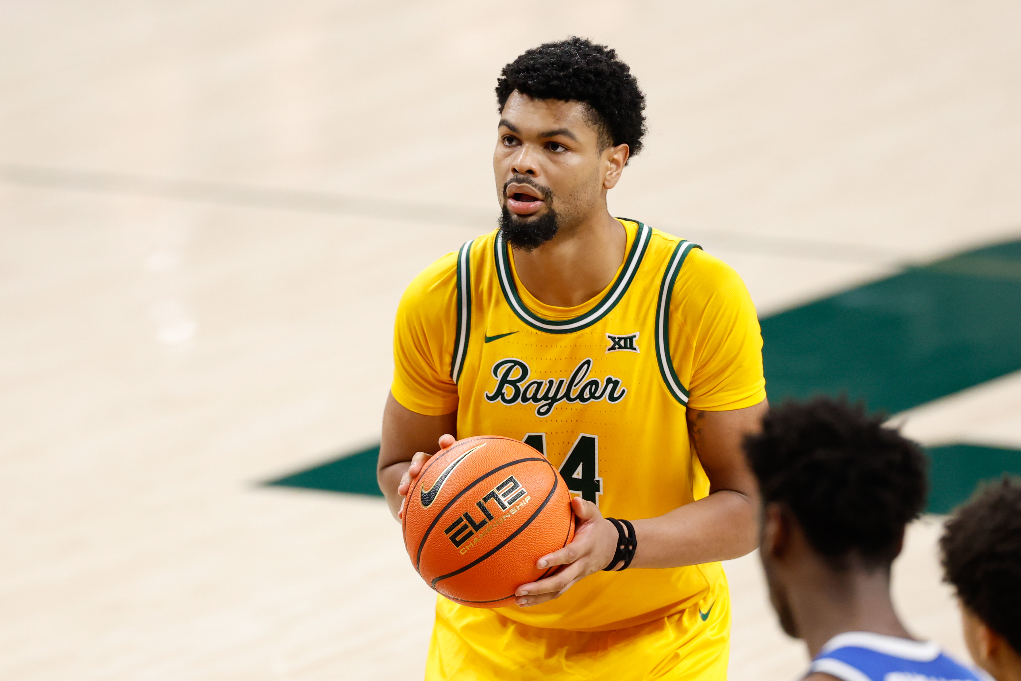 Baylor Bears center Caden Powell (44) shoots a free throw as we break down our Baylor vs. Minnesota prediction, parlay & odds.
