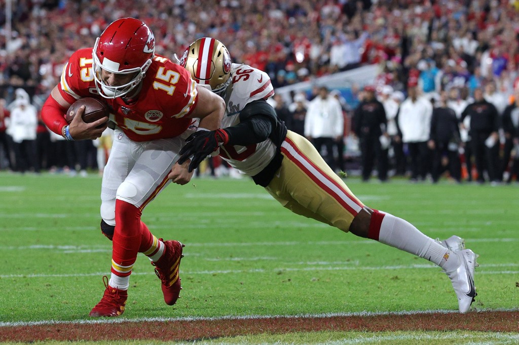 Kansas City Chiefs' quarterback Patrick Mahomes scores as we rank the best Super Bowl performances from Mahomes ahead of Super Bowl 58. 
