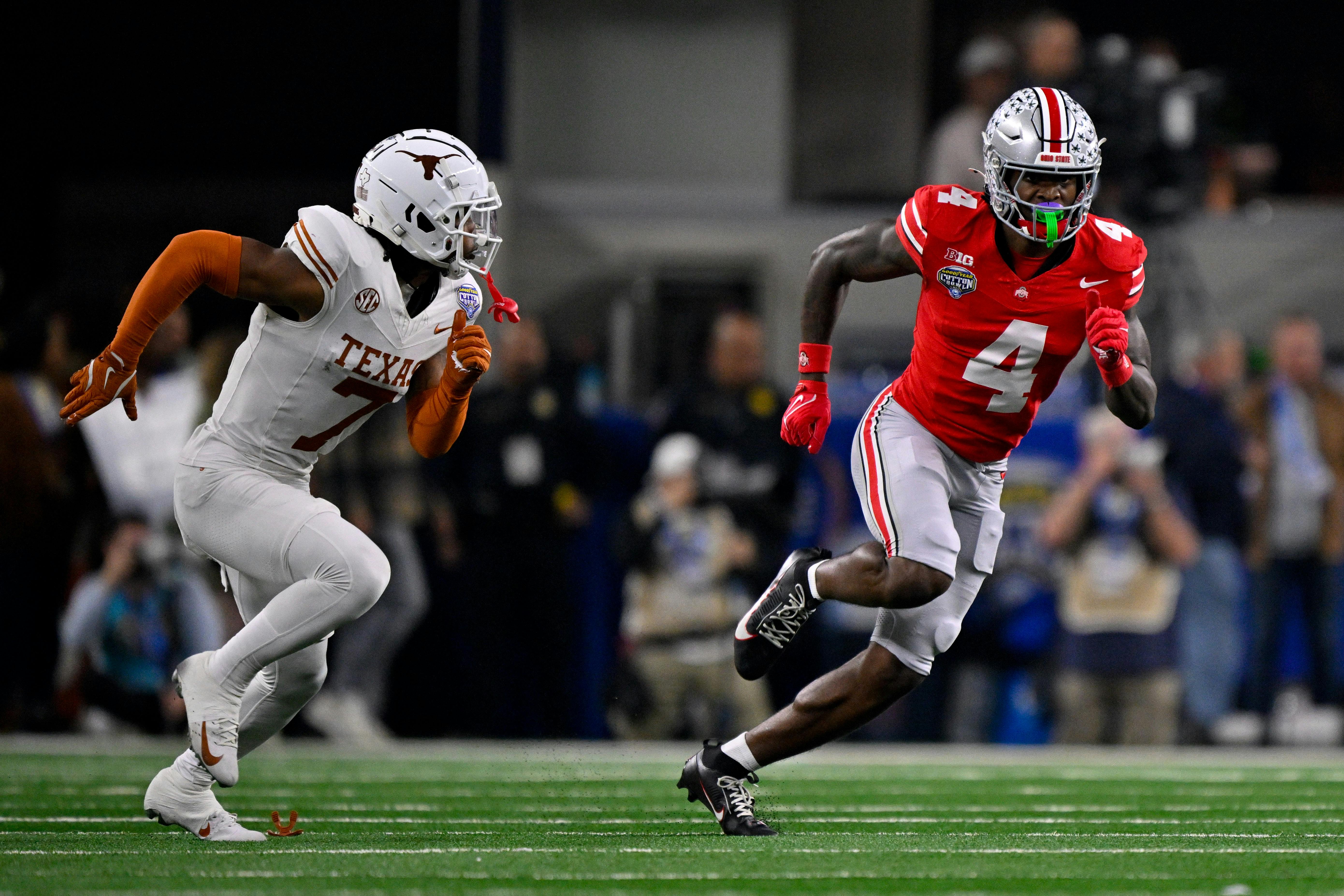 Ohio State wide receiver Jeremiah Smith covered by Texas defensive back Jahdae Barron in the Cotton Bowl. How the Fighting Irish defends Smith is key to our Ohio State vs. Notre Dame preview.