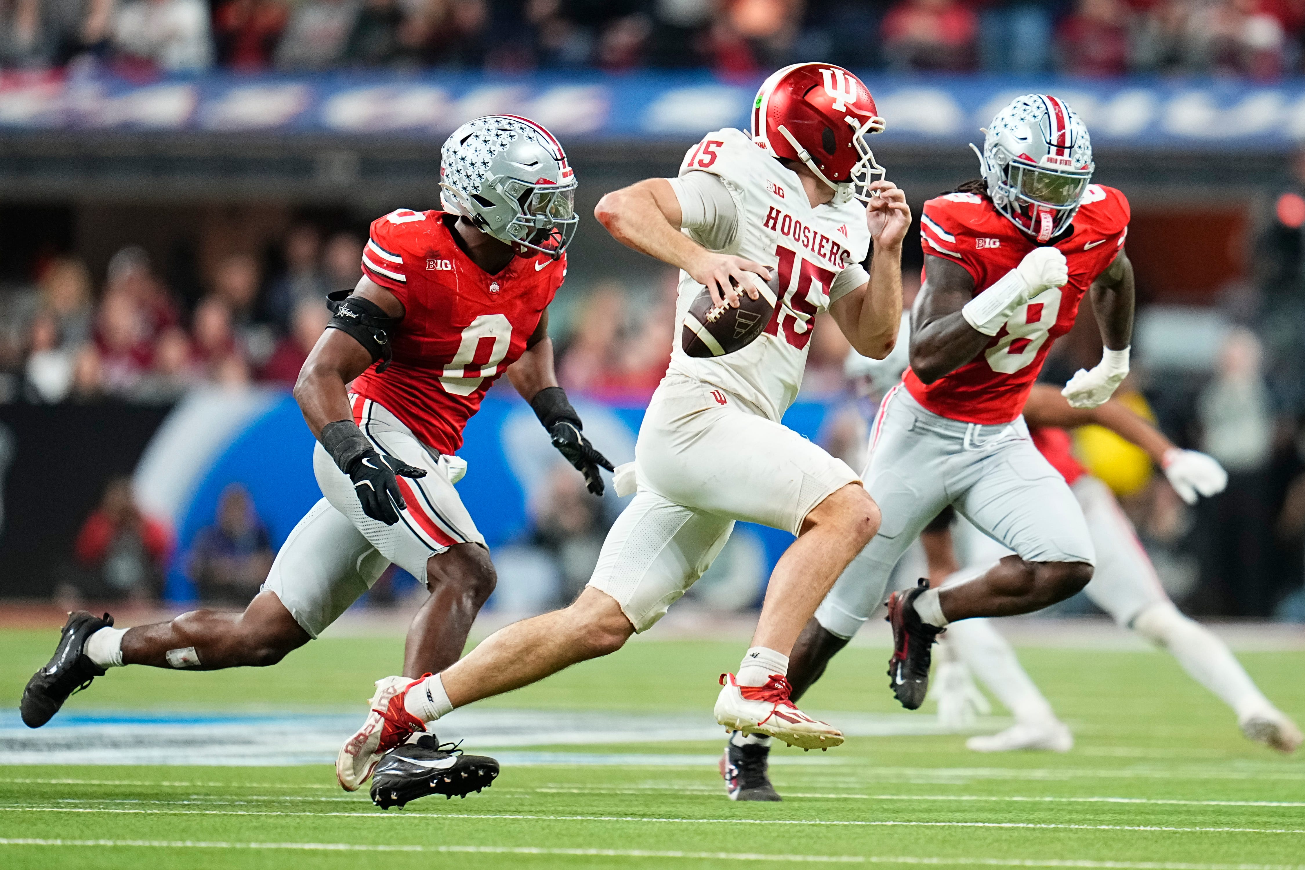 Indiana's Fernando Mendoza (15) and Ohio State's Arvell Reese (8) and Sonny Styles (0) are among the best players in the College Football Playoff.