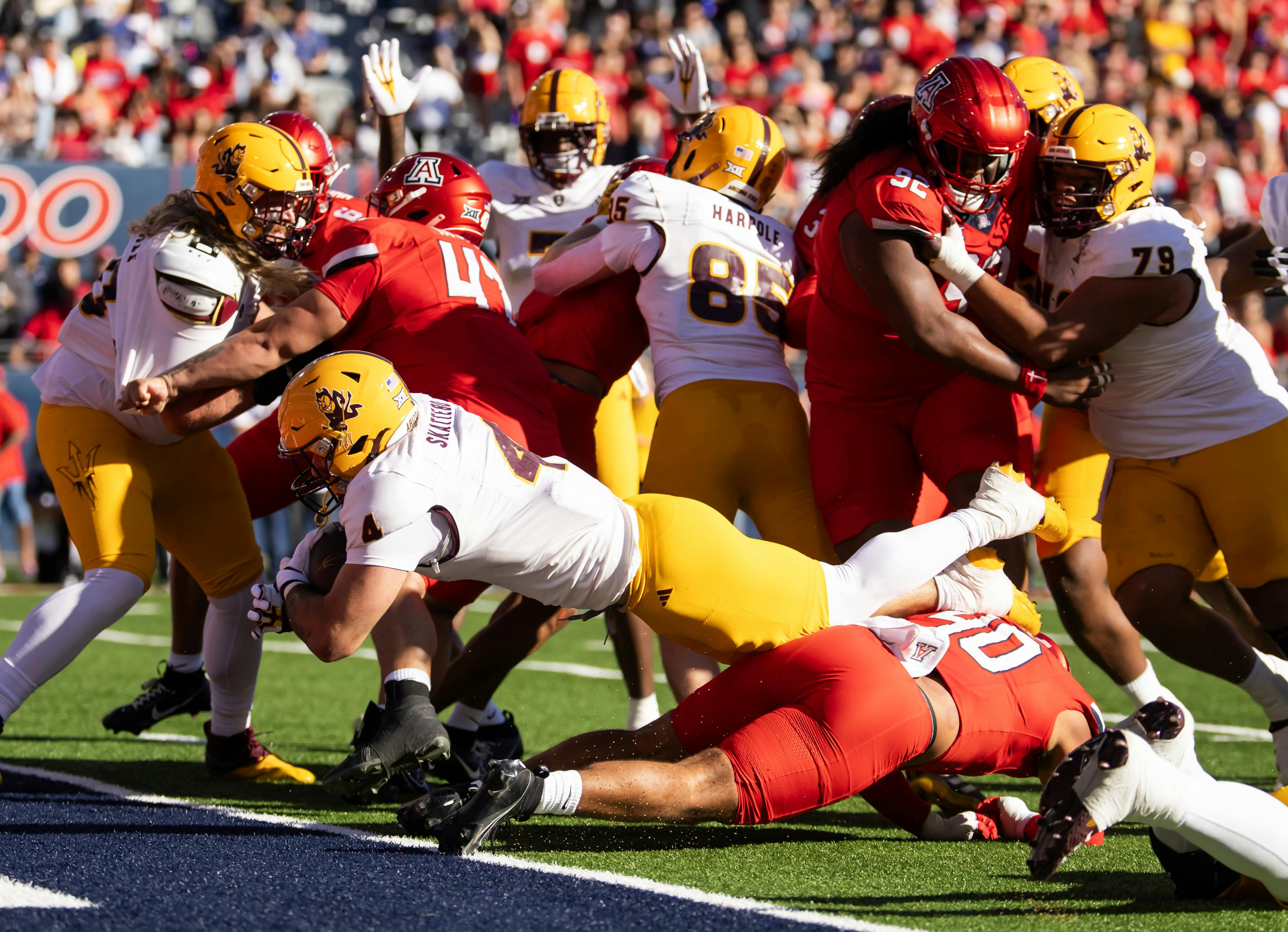 Arizona State running back Cam Skattebo dives into the end zone to score a touchdown against Arizona. We cover the Big 12 title game as part of our college football conference championship predictions.