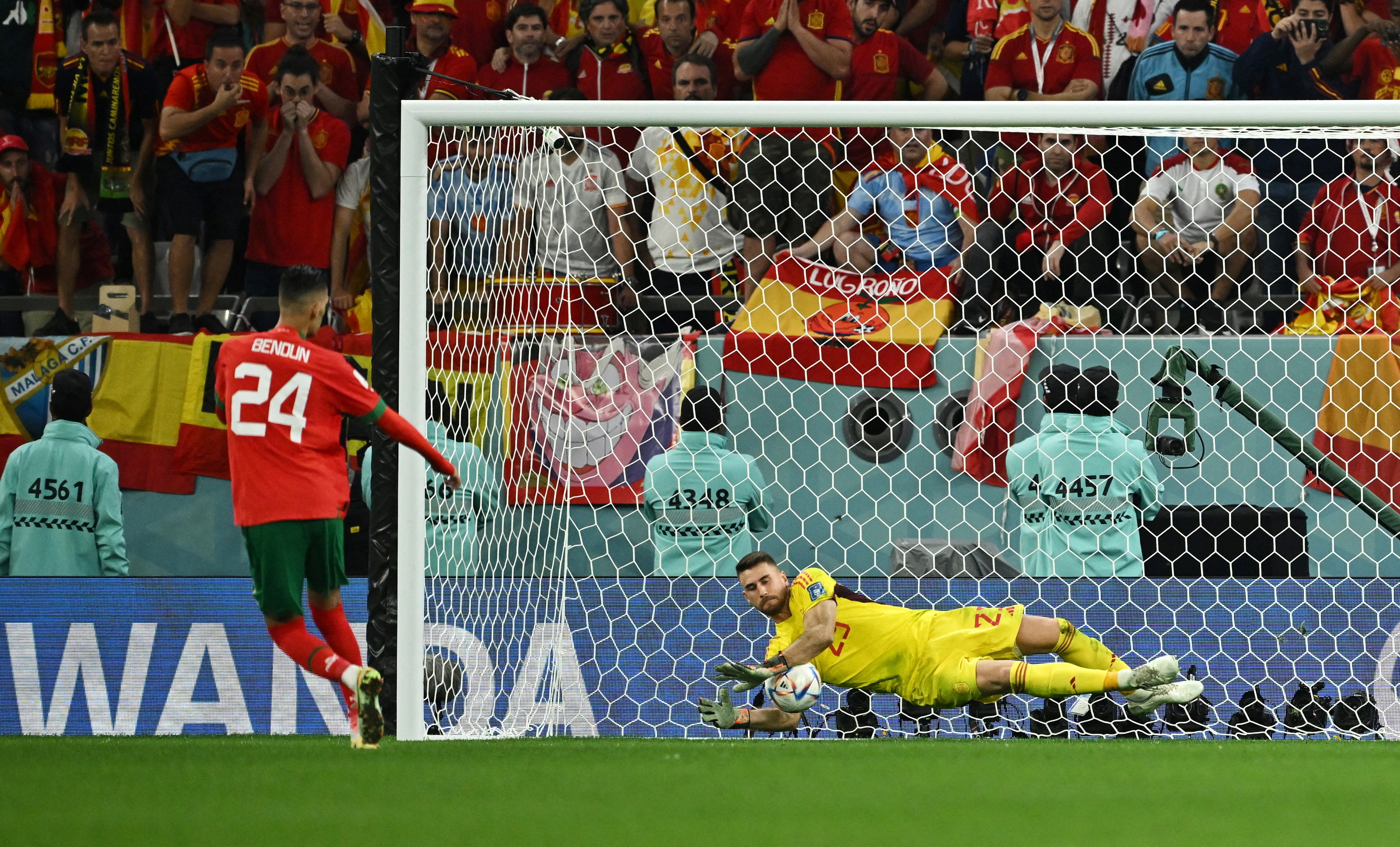 Morocco's Badr Benoun has his penalty saved by Spain's Unai Simon during the penalty shootout.