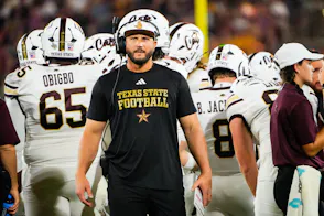 Texas State Bobcats head coach G. J. Kinne during a time-out as make our best James Madison vs. Texas State prediction.