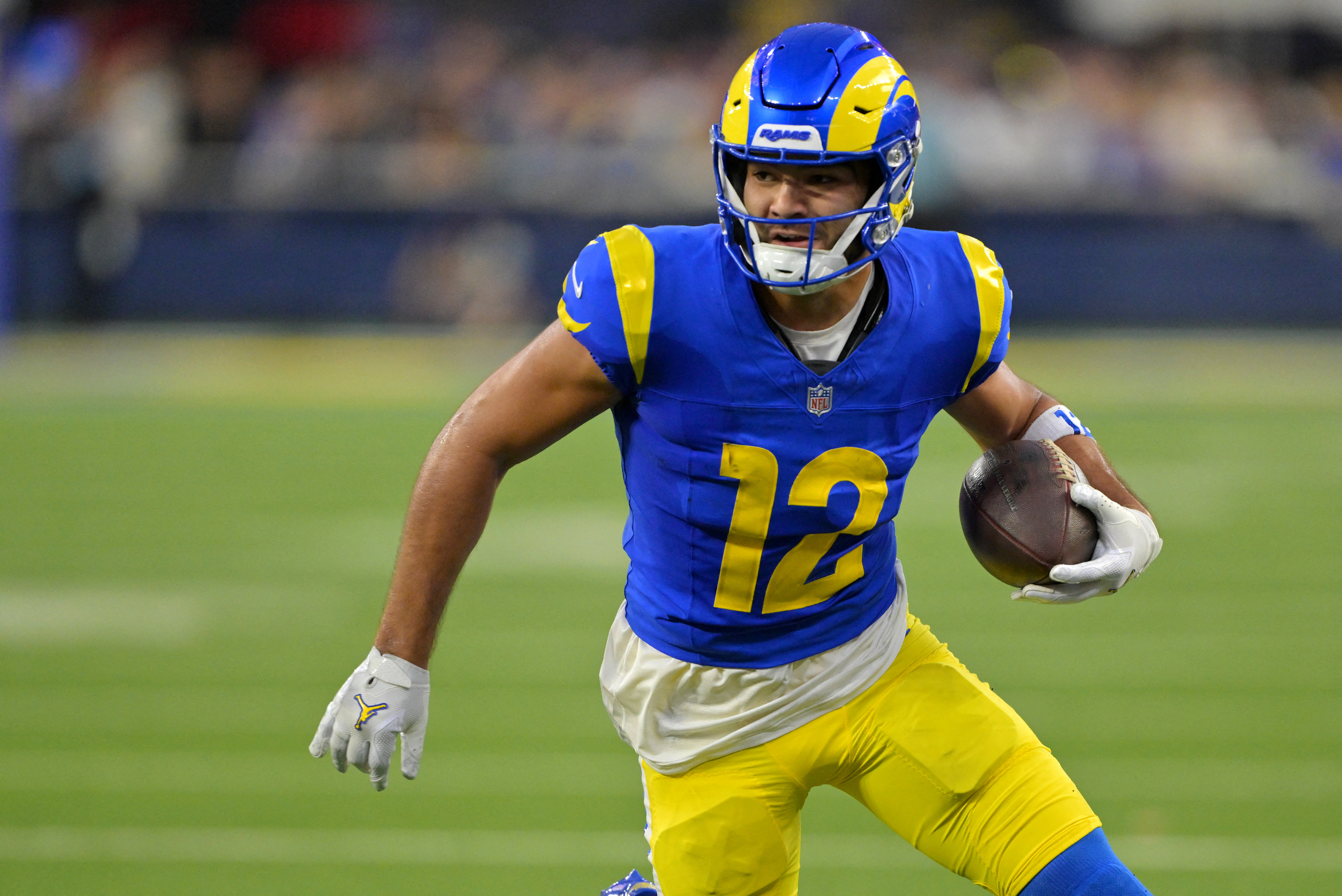 Los Angeles Rams wide receiver Puka Nacua (12) runs after making a catch as we provide our Chargers vs. Rams prediction.