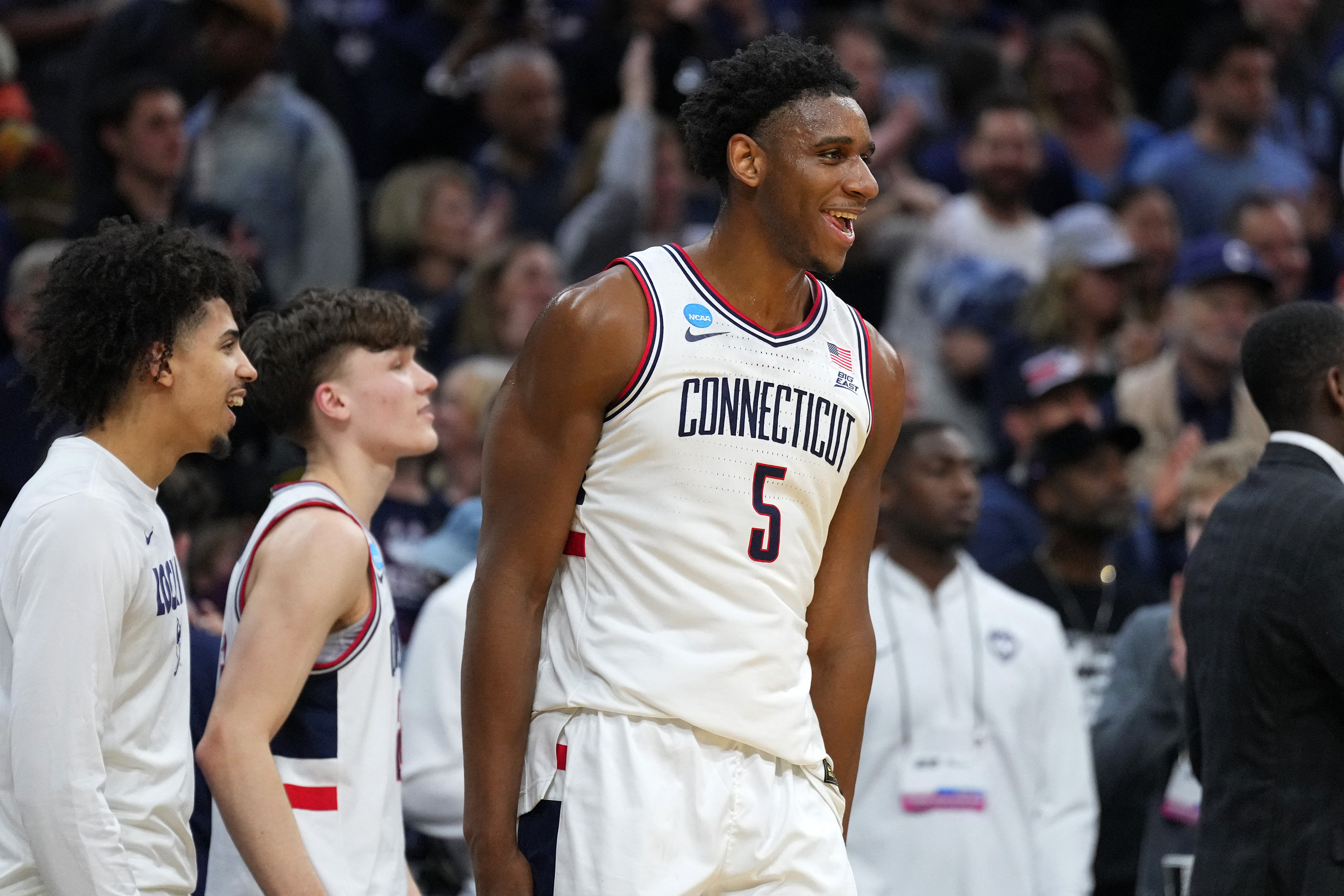 UConn Huskies forward Tarris Reed Jr. (5), seen here reacting after a win, is featured in our Illinois vs. UConn player props today.