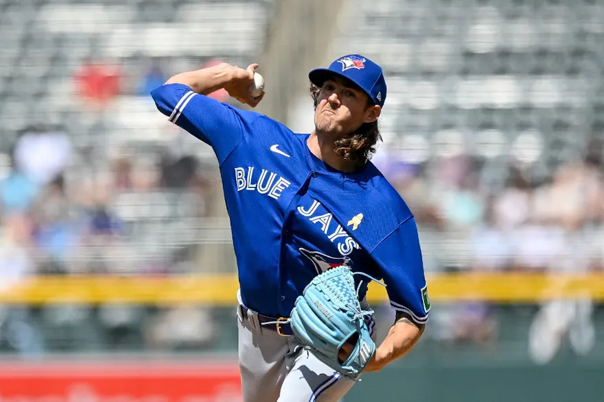 Kevin Gausman of the Toronto Blue Jays pitches against the Colorado Rockies in the first inning at Coors Field as we look at our Blue Jays-Yankees player props.