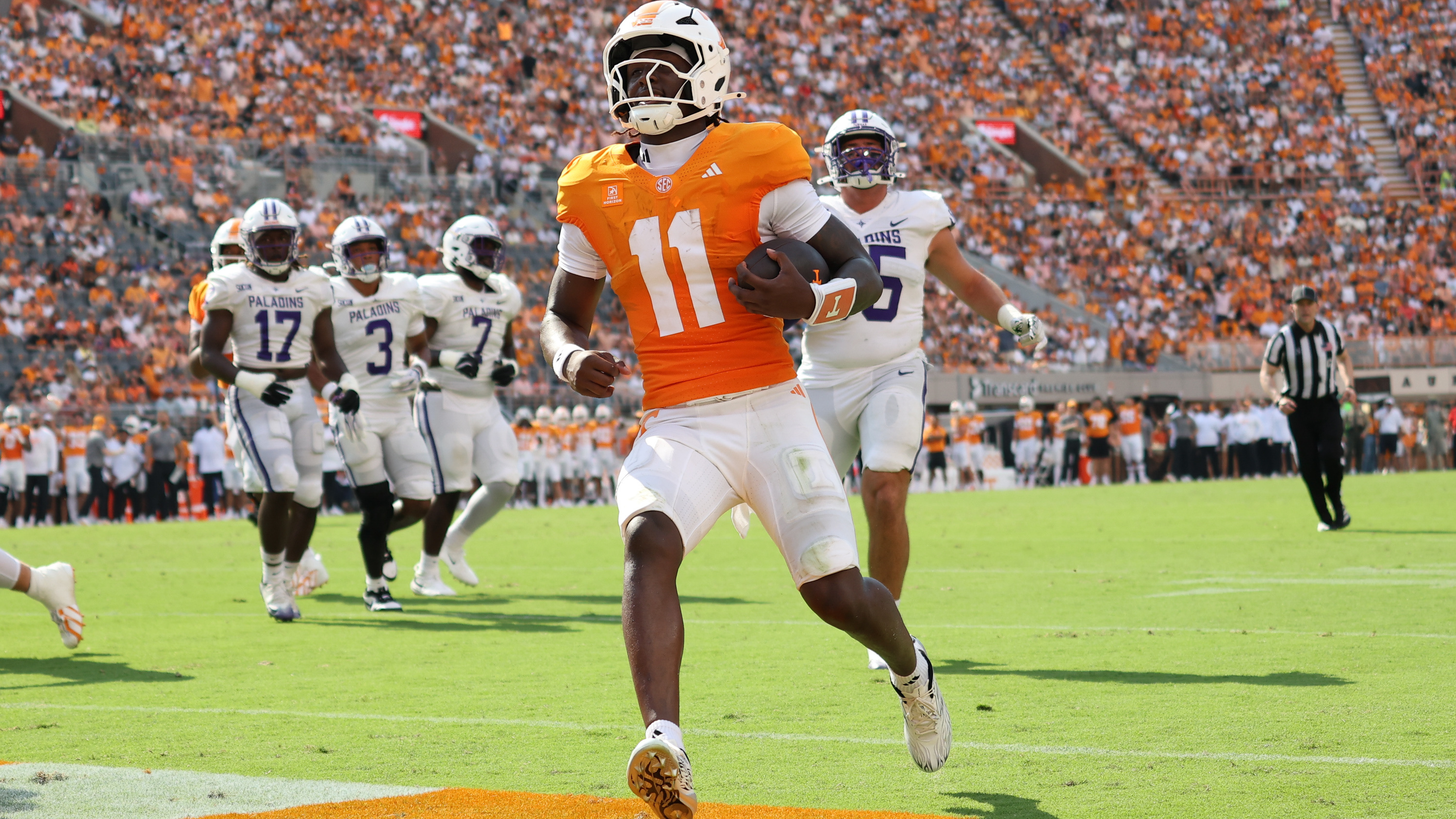 Tennessee Volunteers quarterback Faizon Brandon (11) runs for a touchdown as we break down our Tennessee vs. Georgia Tech prediction. Photo by Randy Sartin | Imagn Images.