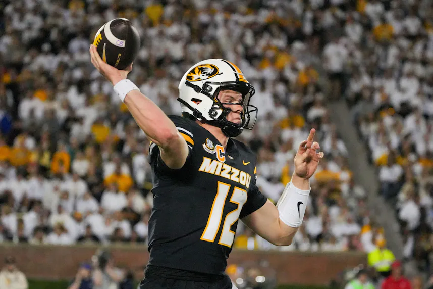 Missouri Tigers quarterback Brady Cook throws a pass as we look at Mike Leara's appointment as the Missouri Gaming Commission Executive Director