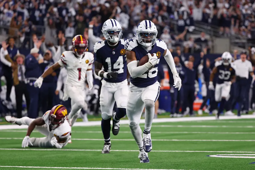 DaRon Bland #26 of the Dallas Cowboys returns an interception for a touchdown as we look at his best odds to win NFL Defensive Player of the Year.