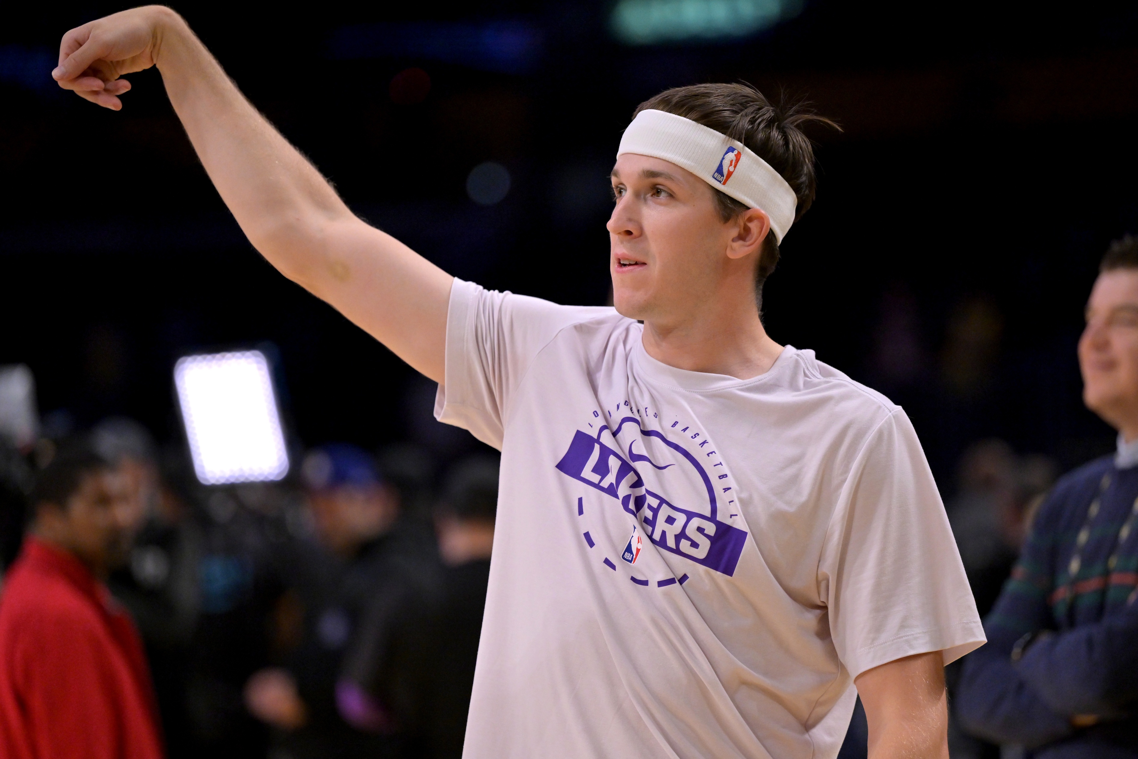 Los Angeles Lakers guard Austin Reaves (15) warms up as he is featured in our Rockets vs. Lakers same-game parlay.