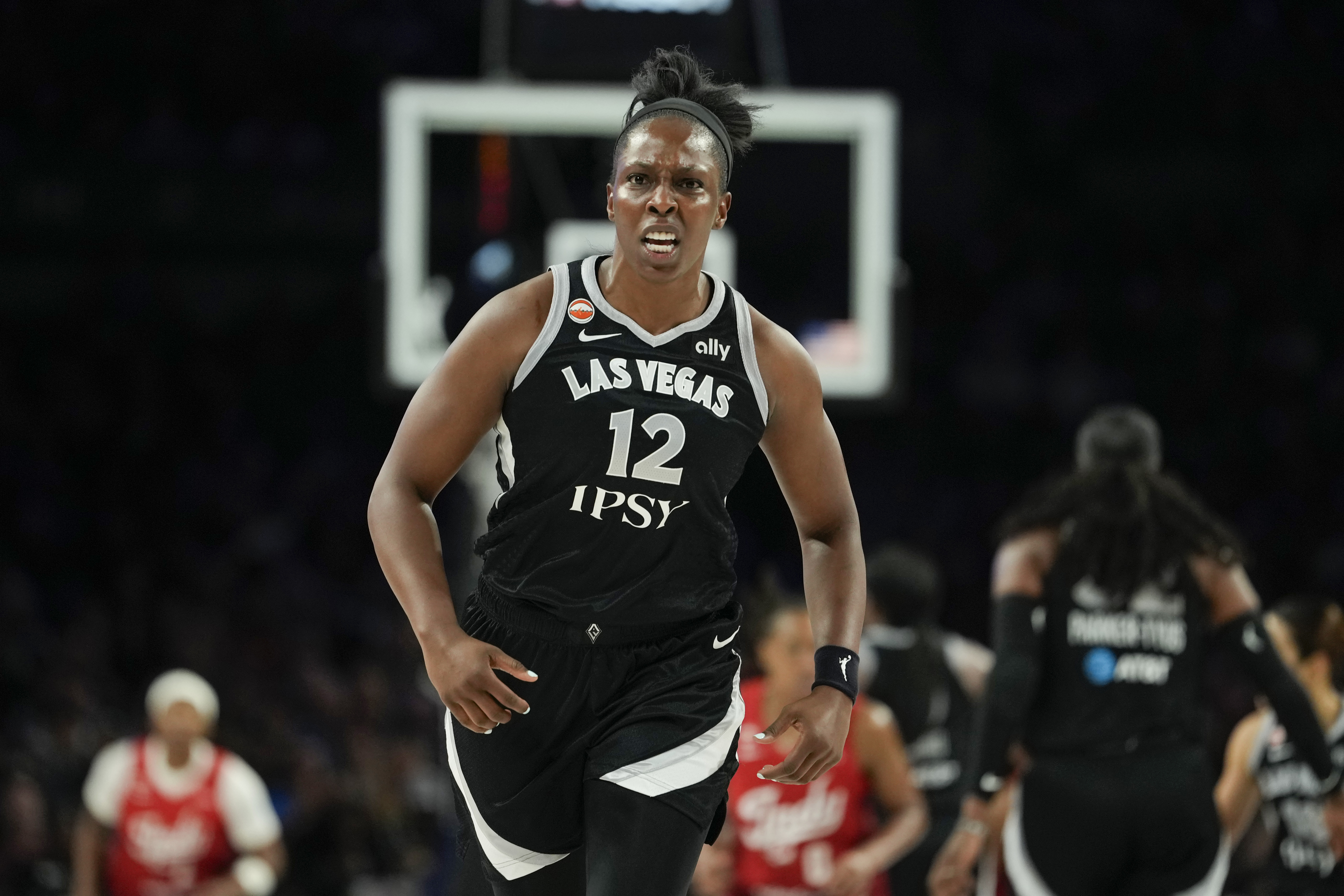 Las Vegas Aces guard Chelsea Gray (12) runs down the court as she is featured in our Aces vs. Valkyries prediction.