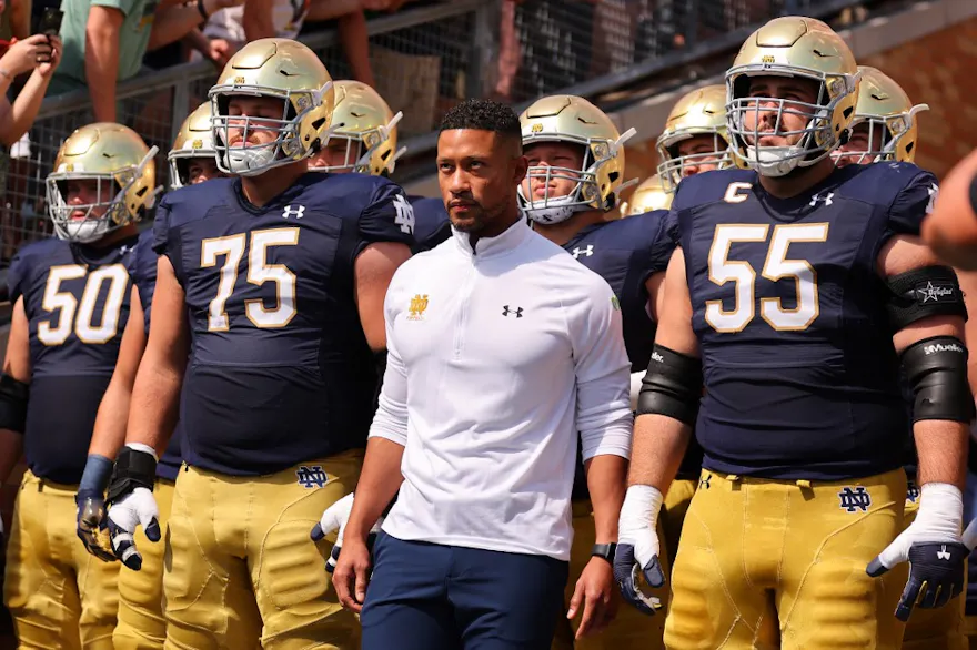 Head coach Marcus Freeman of the Notre Dame Fighting Irish takes the field as share our favorite Navy vs. Notre Dame prediction for Week 0.
