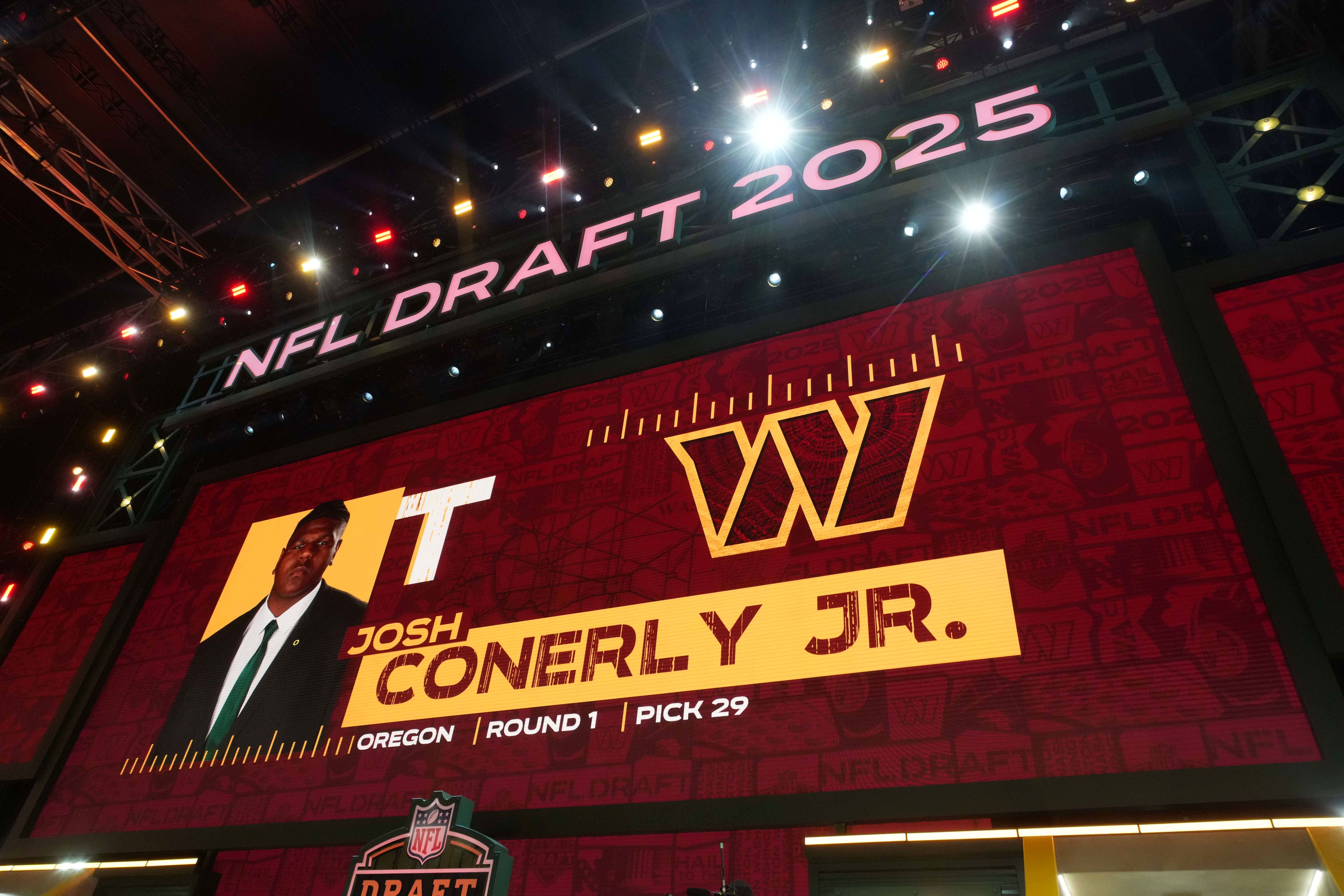 Oregon Ducks tackle Josh Conerly Jr. is selected as the No. 29 pick by the Washington Commanders during the NFL Draft at Lambeau Field.
