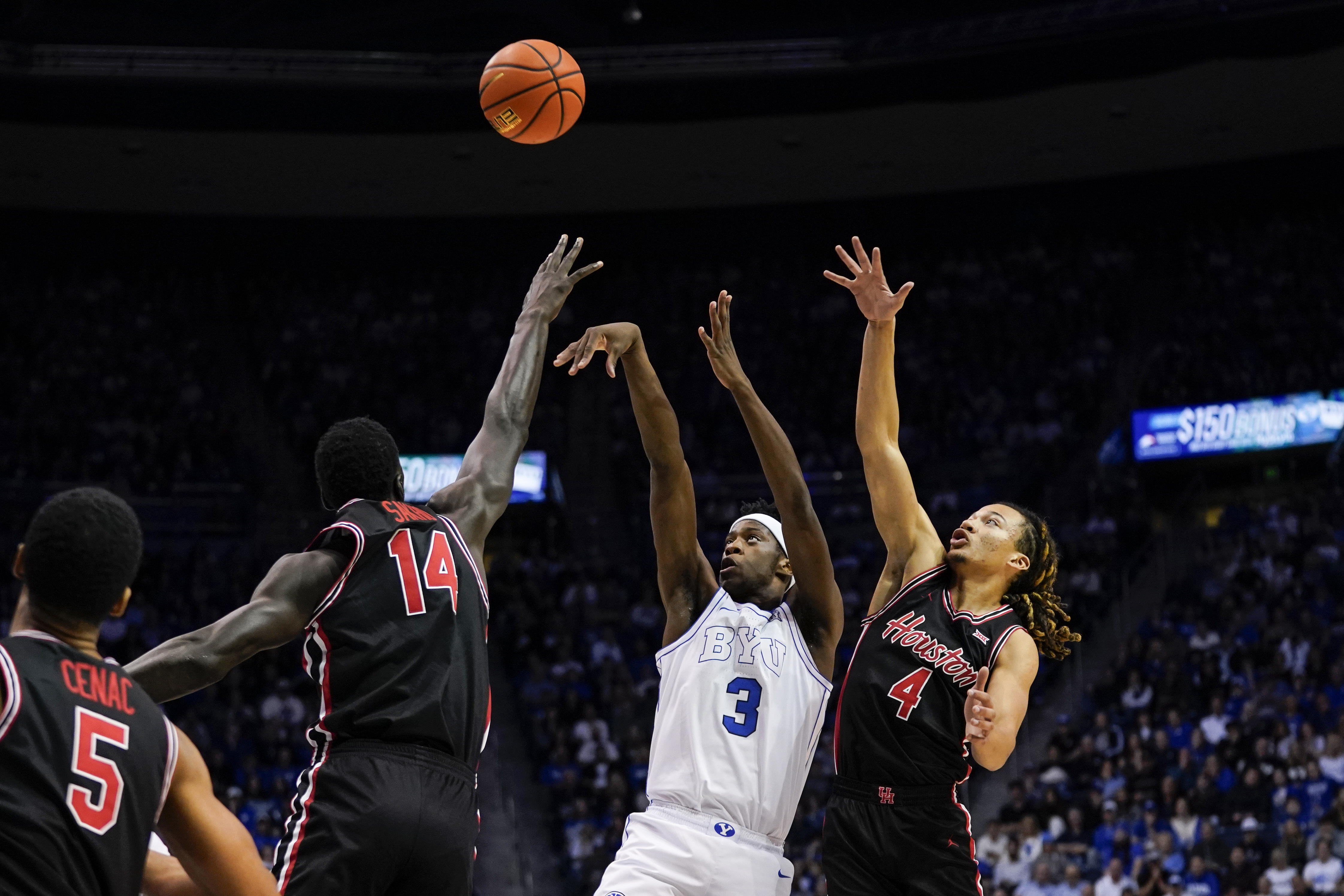 BYU's AJ Dybantsa (3) and Houston's Kingston Flemings (4) are the focus of our college basketball predictions and best bets today.