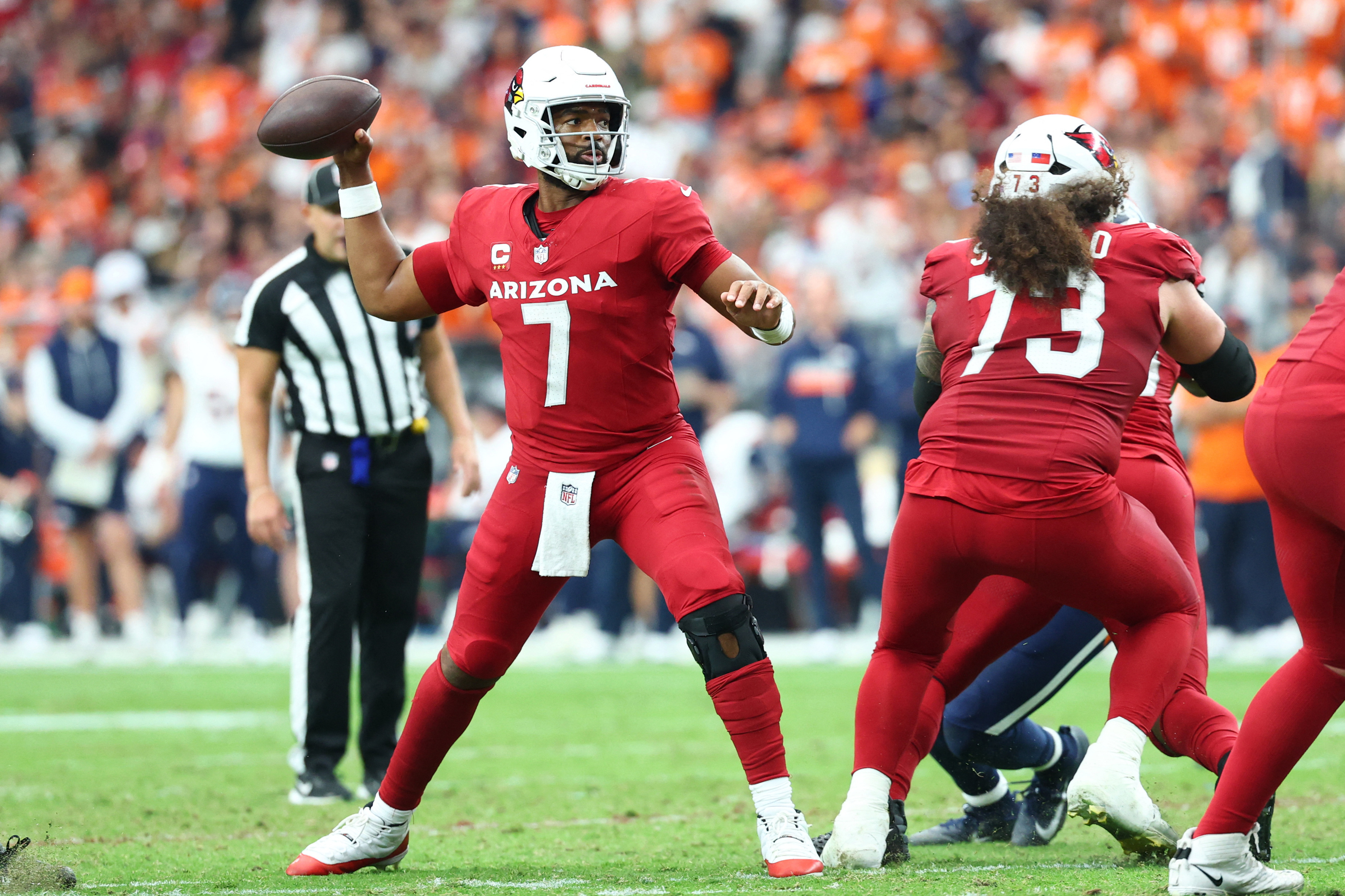 Pictured: Jacoby Brissett throwing a pass as we break down our Cardinals vs. Cowboys Prediction. Photo by Mark J. Rebilas-Imagn Images.