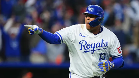 Salvador Perez of the Kansas City Royals reacts after hitting a home run against the Baltimore Orioles, and we offer our top MLB player props and expert picks based on the best MLB odds.